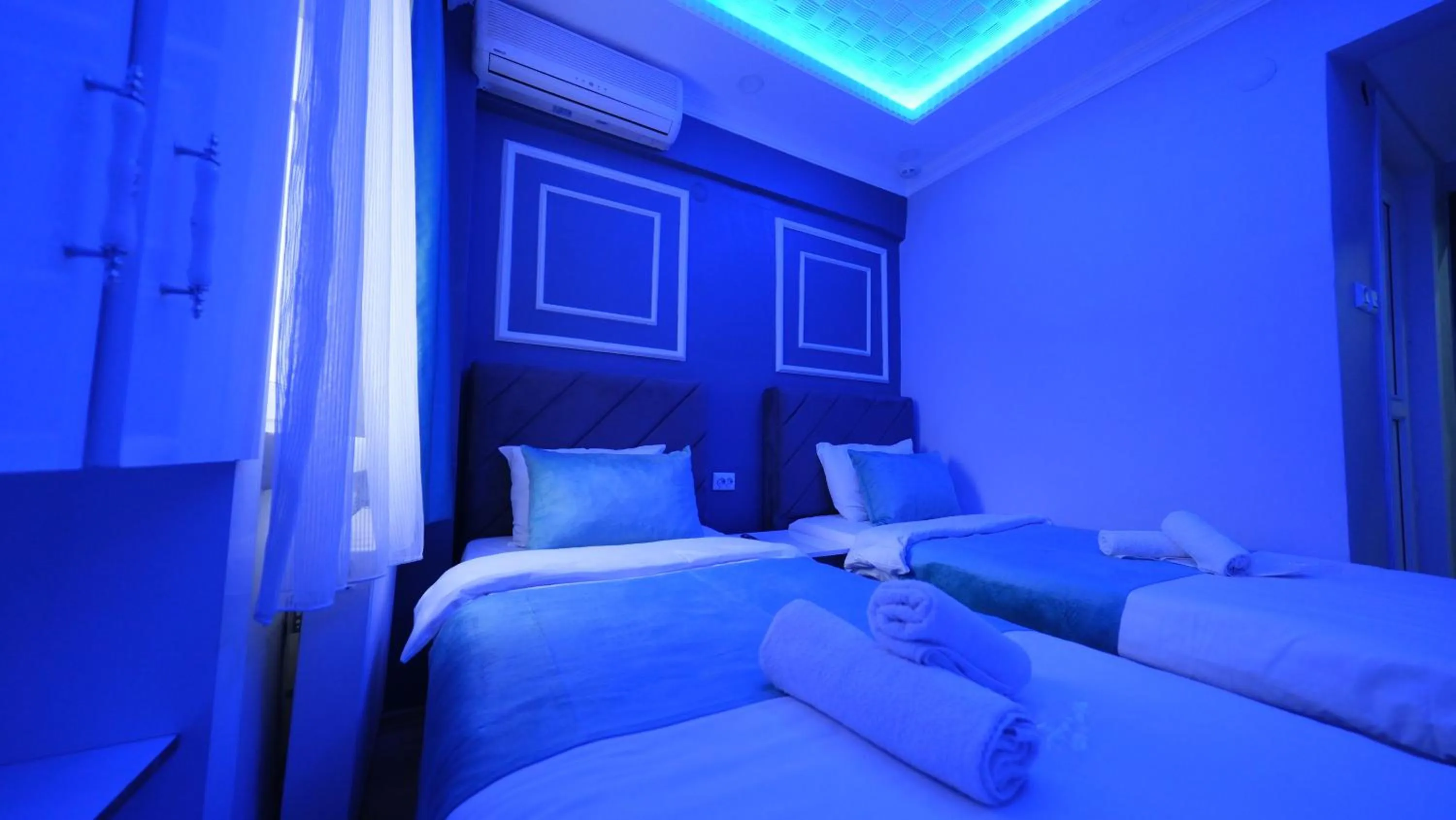 Bed in Bona Sera Hotel