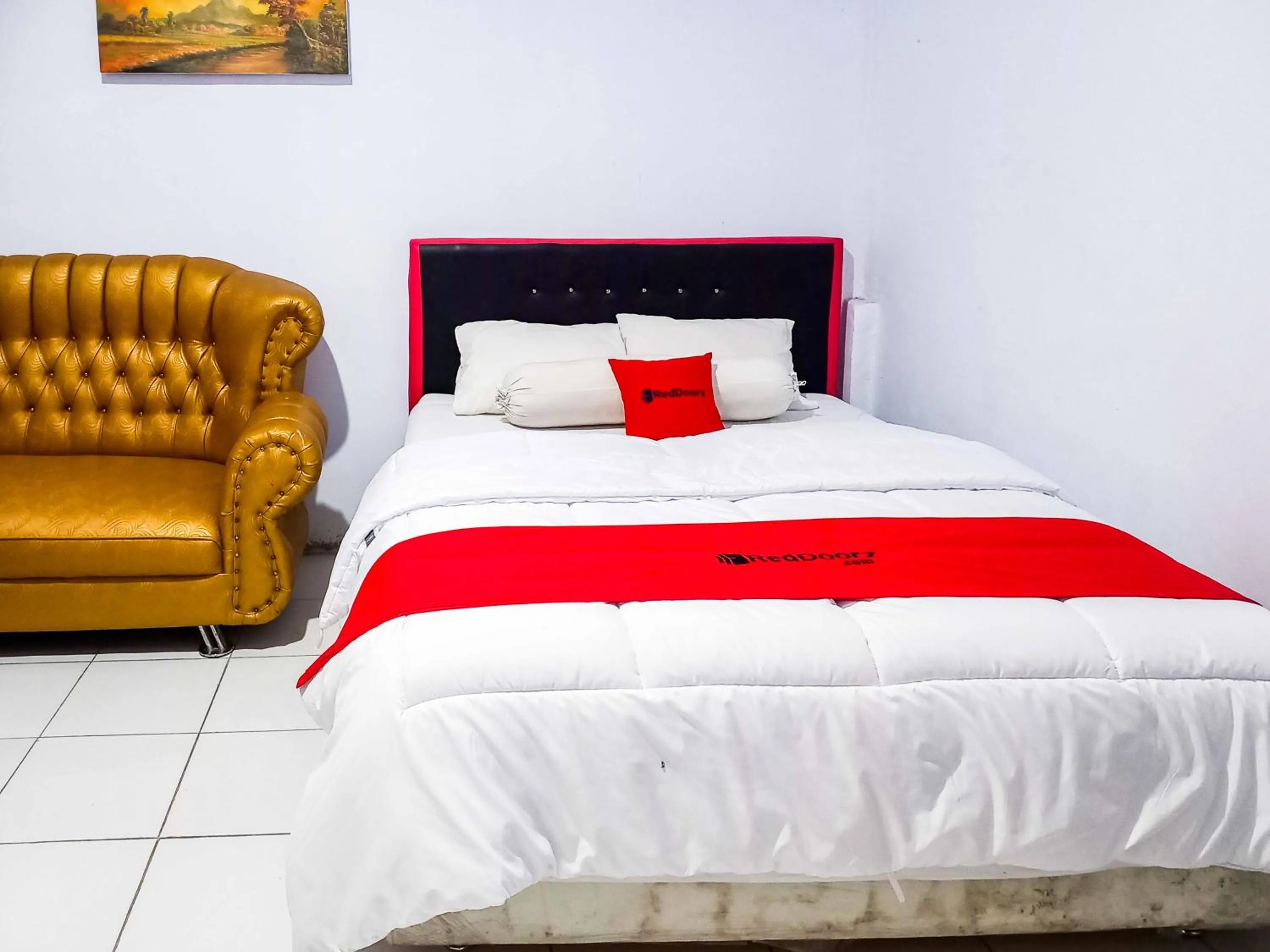 Bed in RedDoorz @ Lolak Bolaang Mongondow