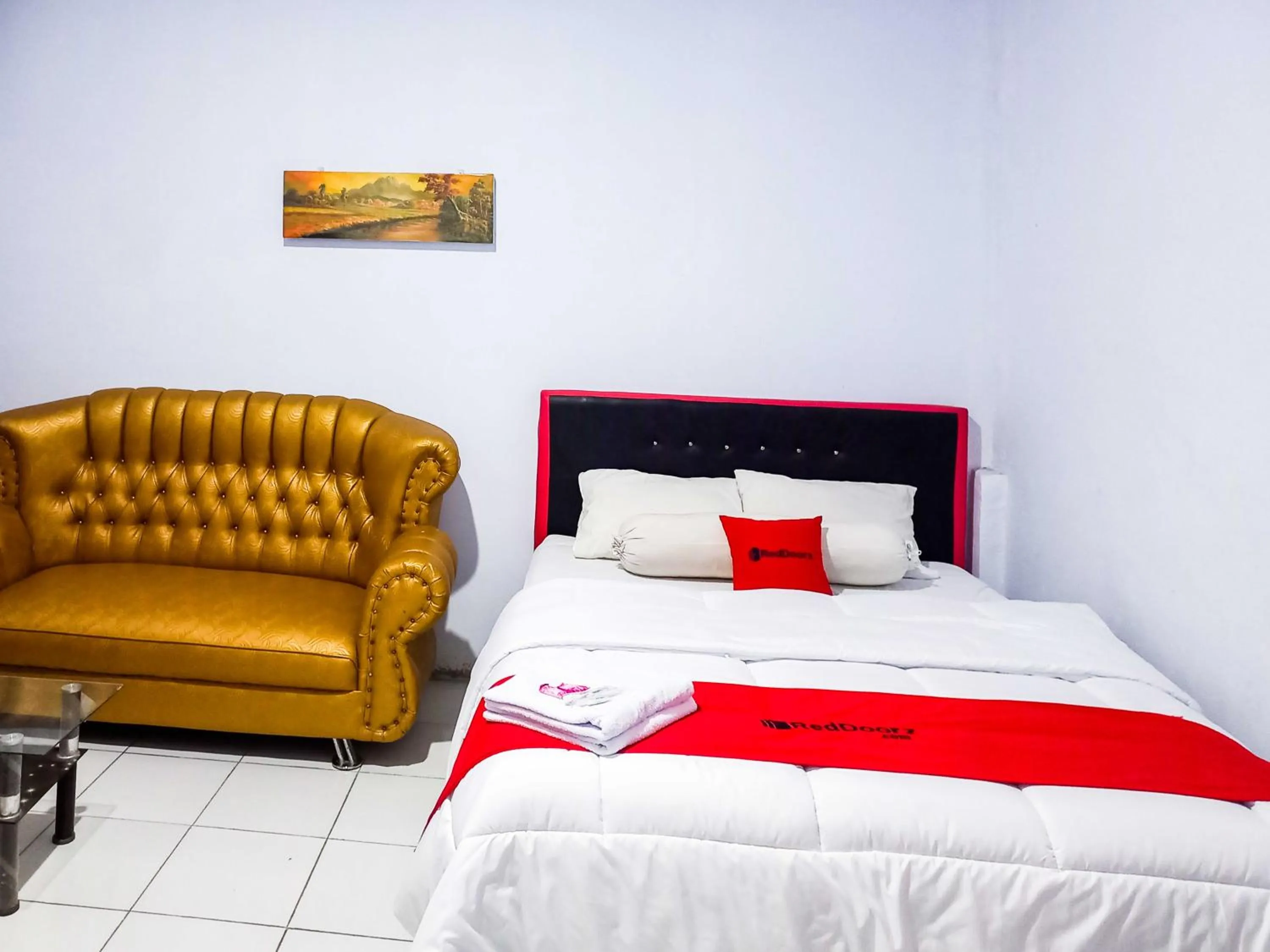 Bed in RedDoorz @ Lolak Bolaang Mongondow