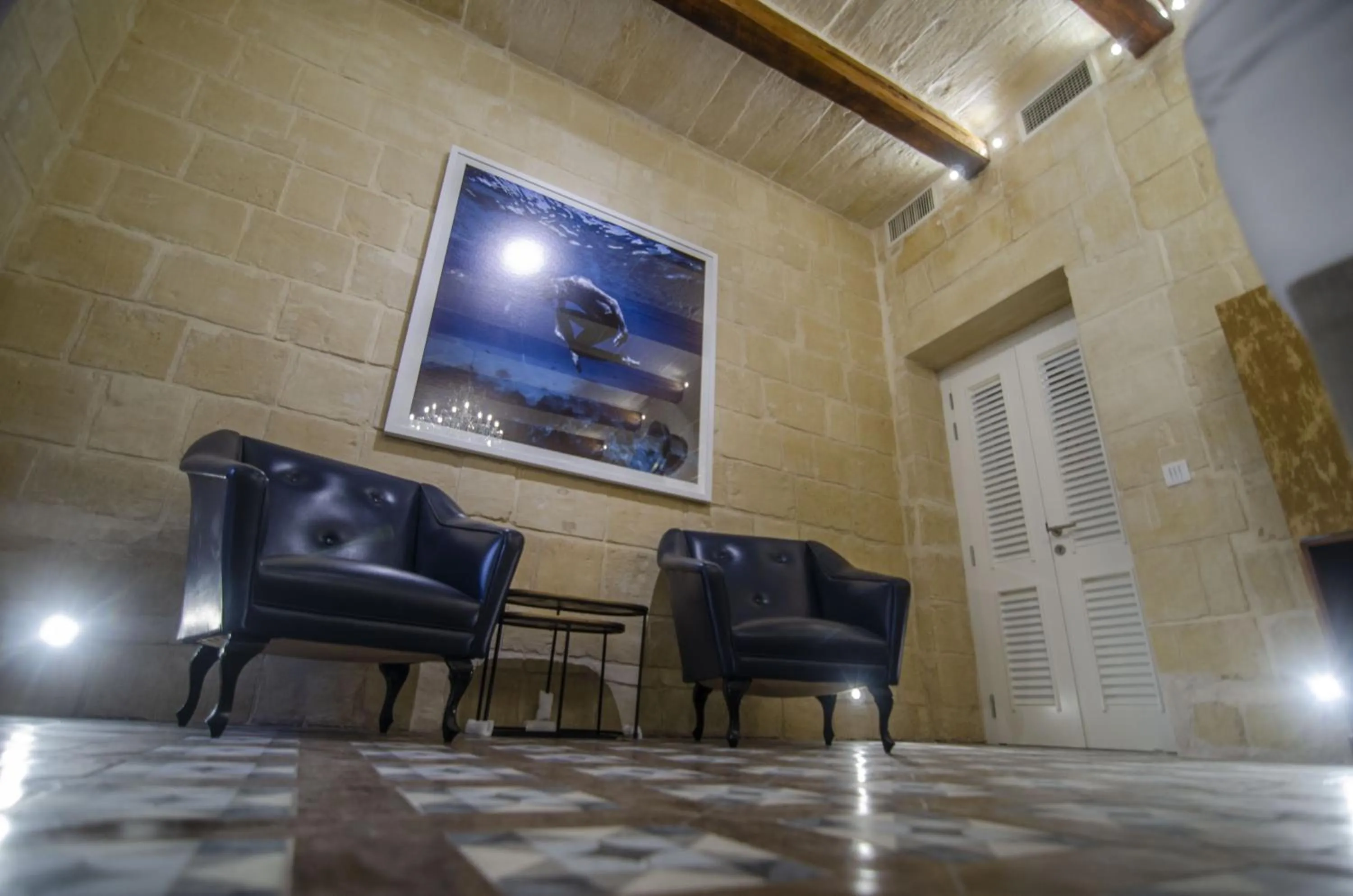Seating area in Senglea Suites