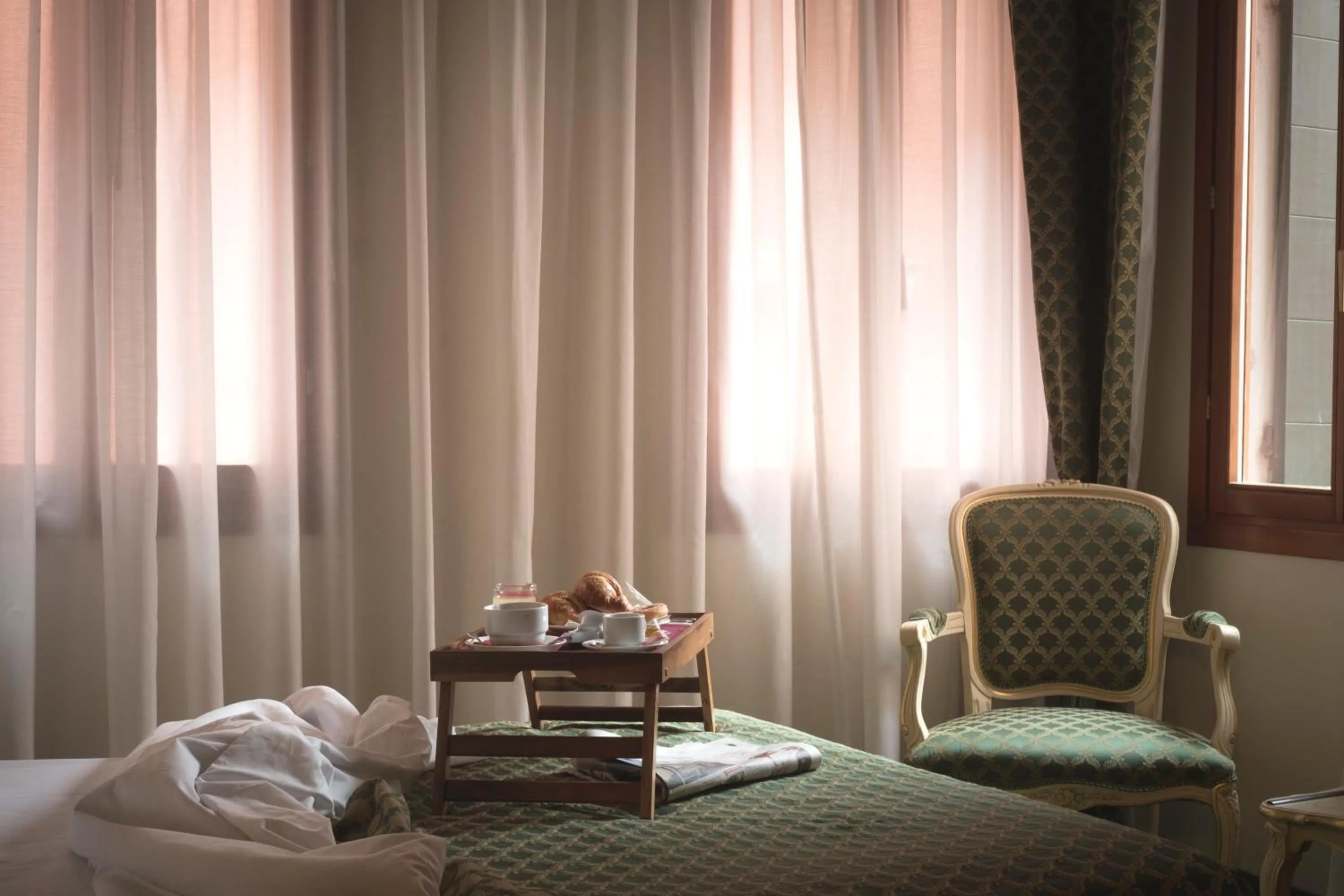 Decorative detail, Bed in Hotel Commercio & Pellegrino