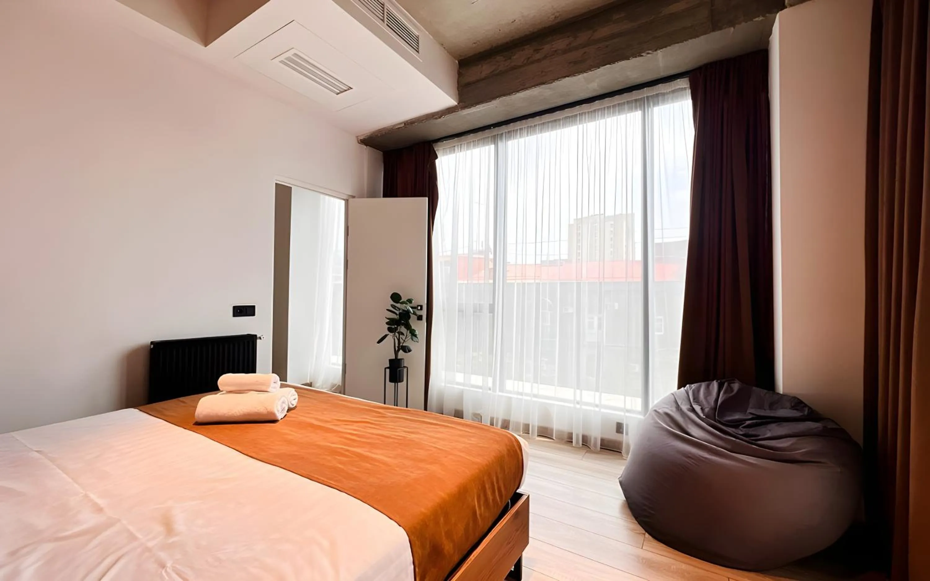 Bed in Rooms Apart Hotel by RED