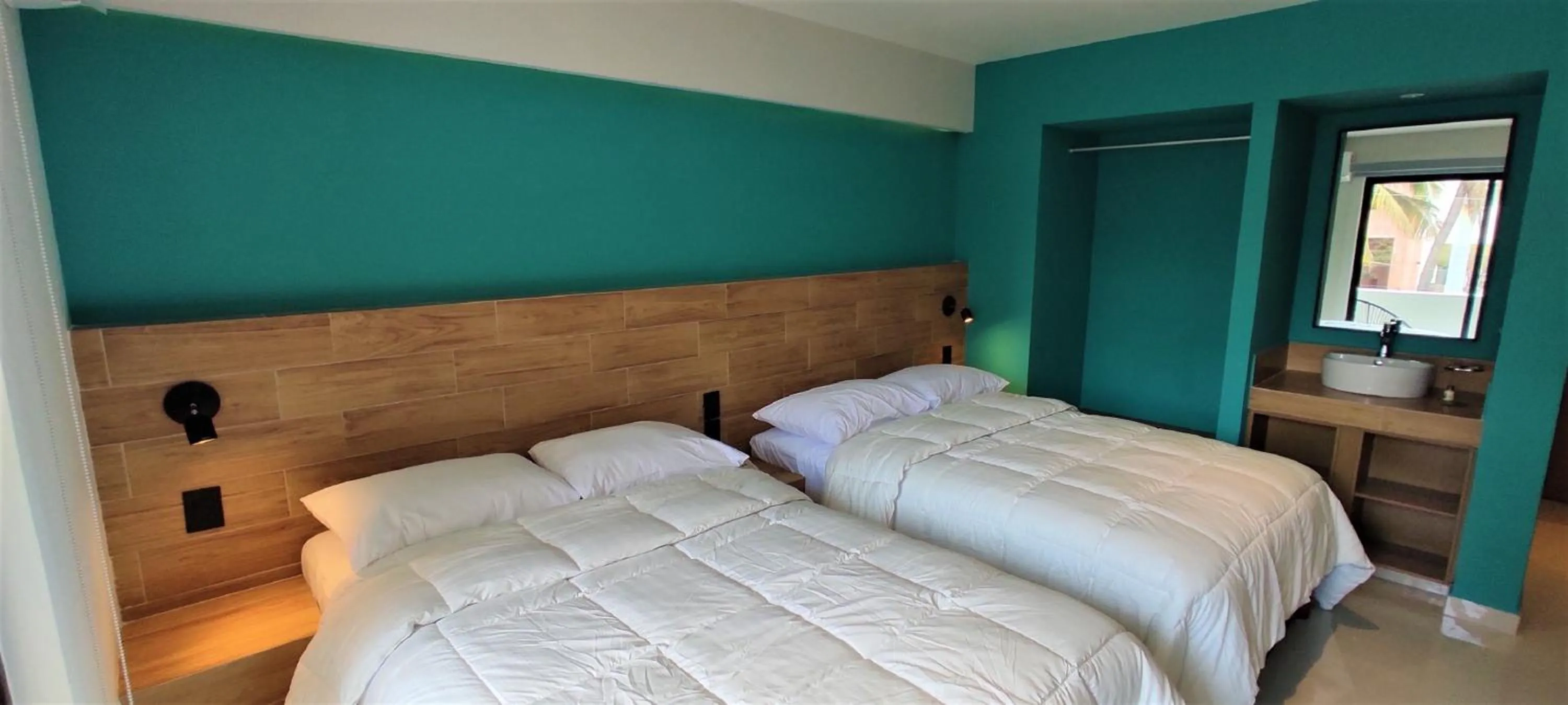 Bed in Hotel Kavia Mazatlán