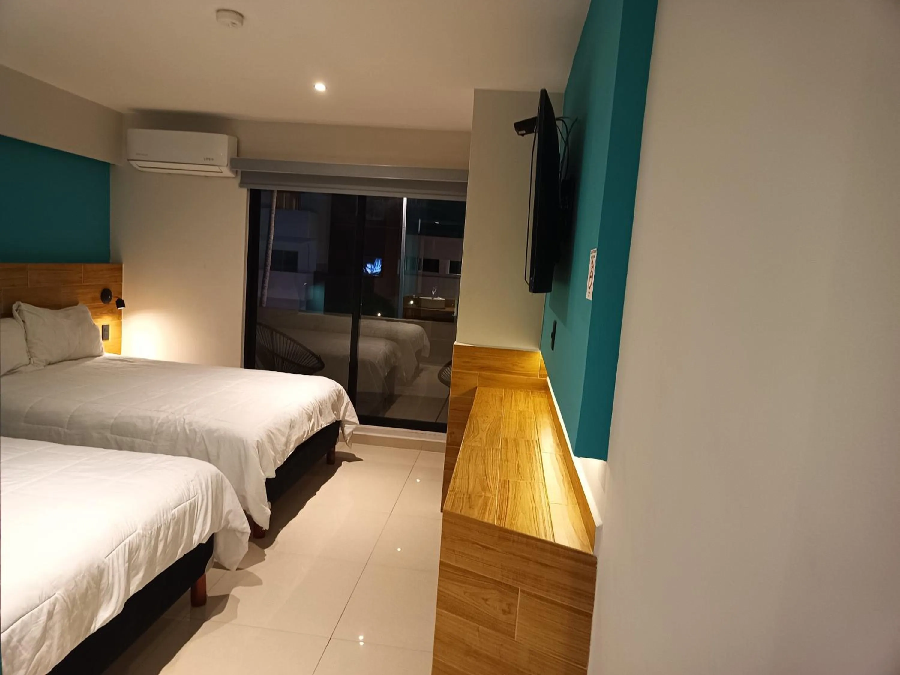 Bed in Hotel Kavia Mazatlán