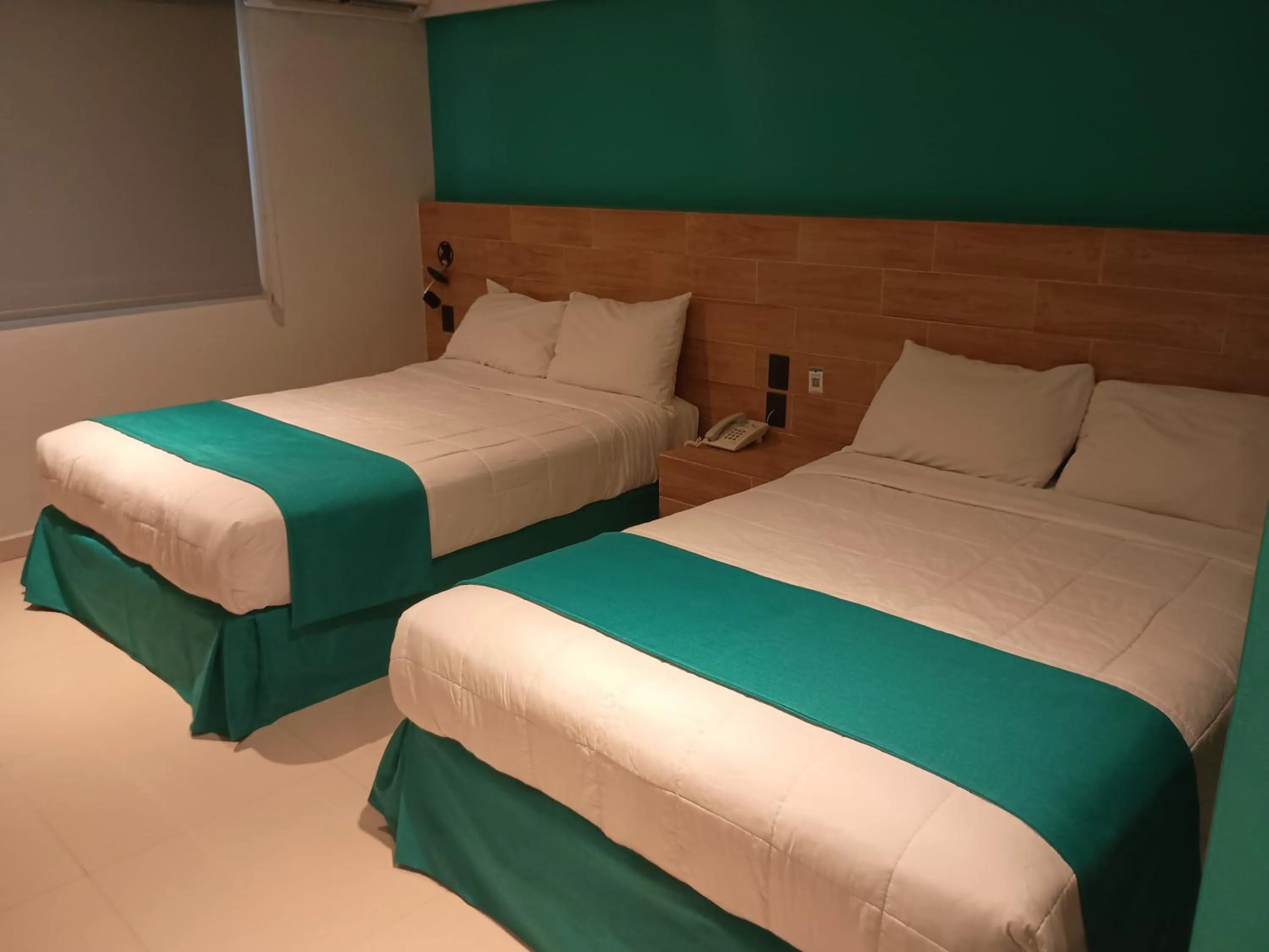 Bed in Hotel Kavia Mazatlán