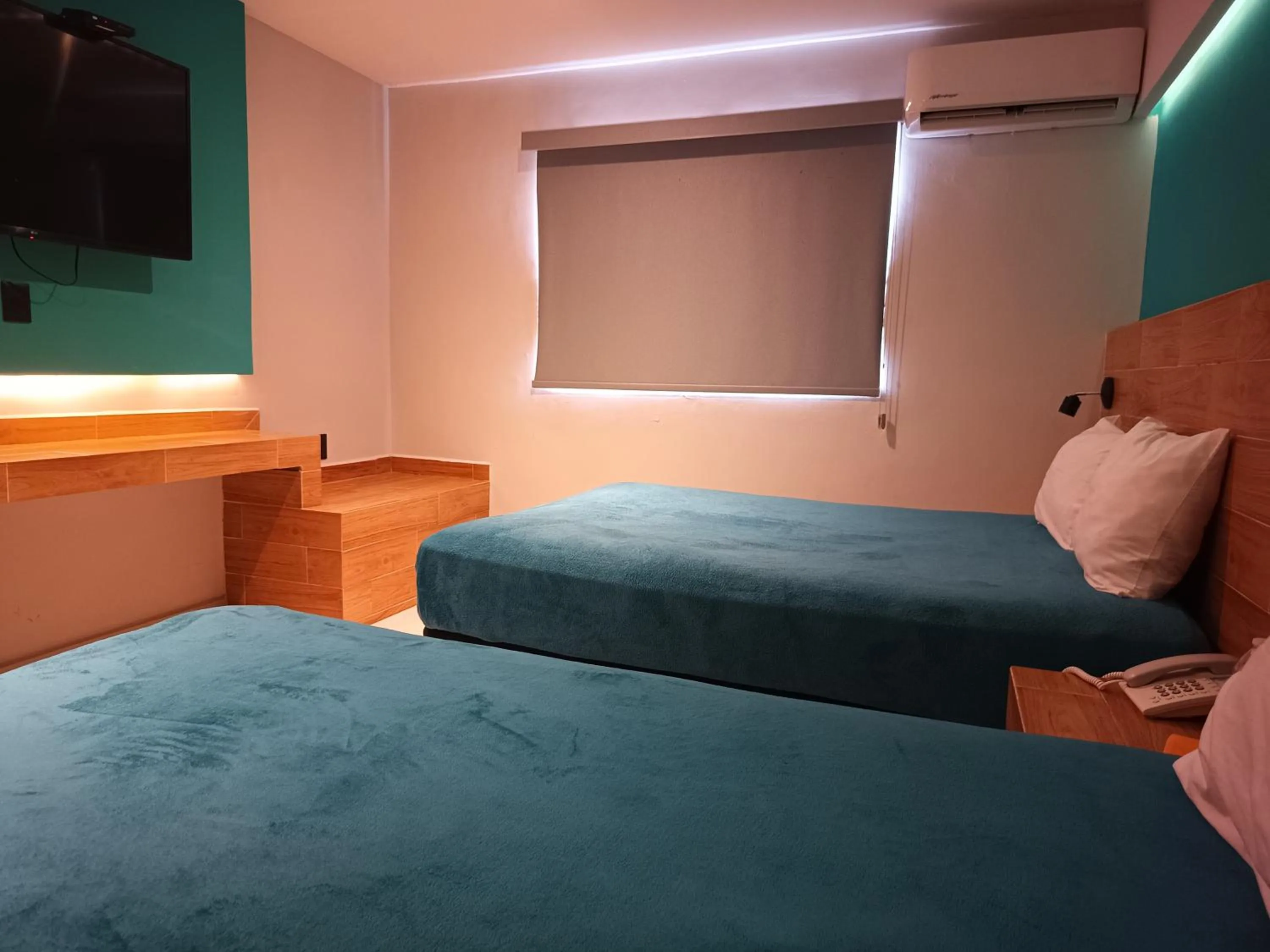 Bed in Hotel Kavia Mazatlán