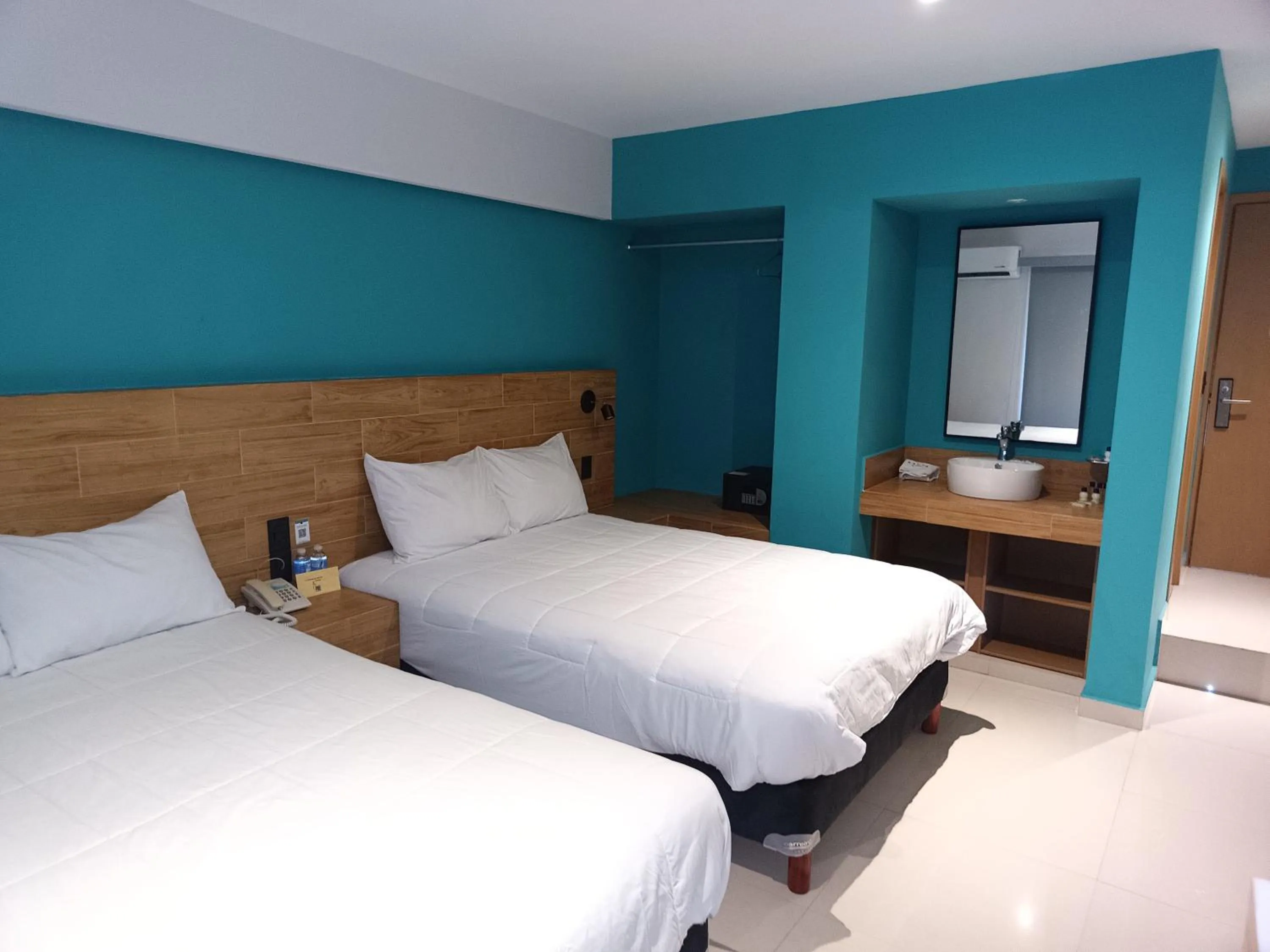 Bed in Hotel Kavia Mazatlán