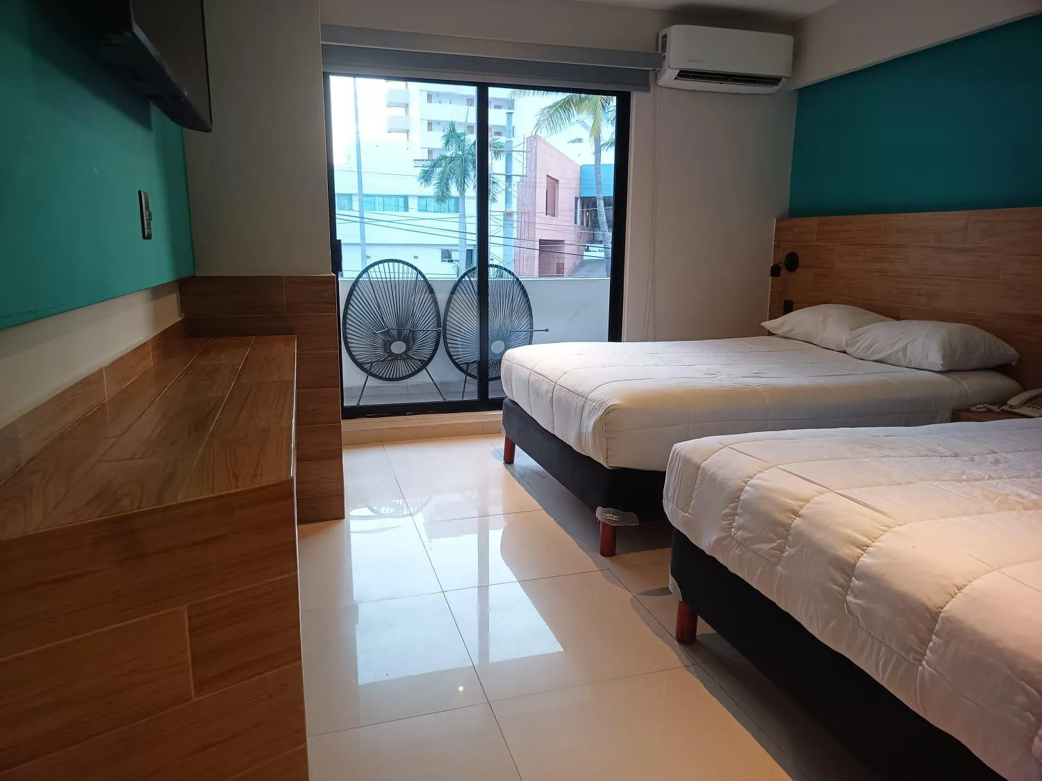 Photo of the whole room, Bed in Hotel Kavia Mazatlán