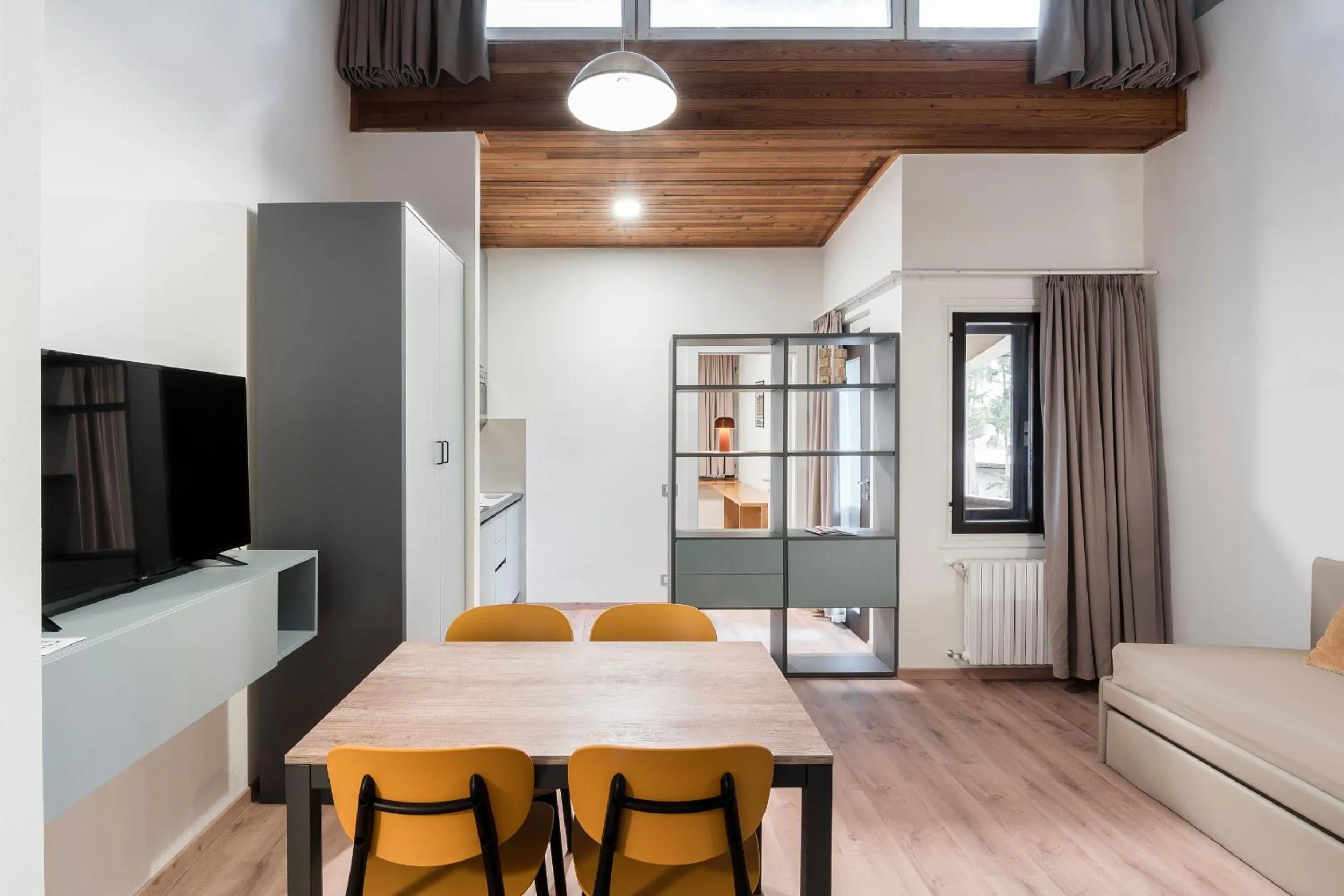 Communal lounge/ TV room in Appartamenti Corte Residence