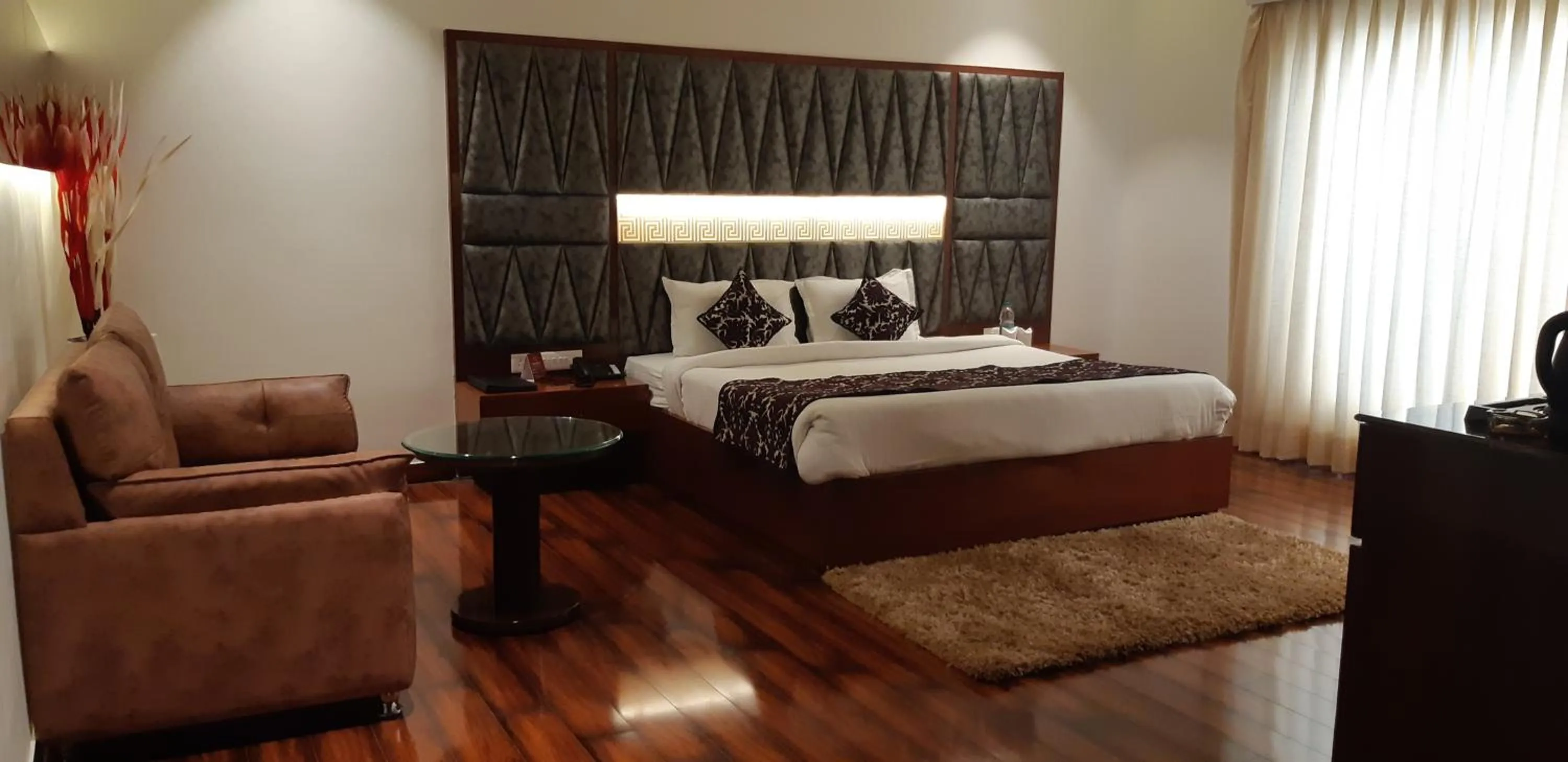 Bed in Grand Geet Hotels