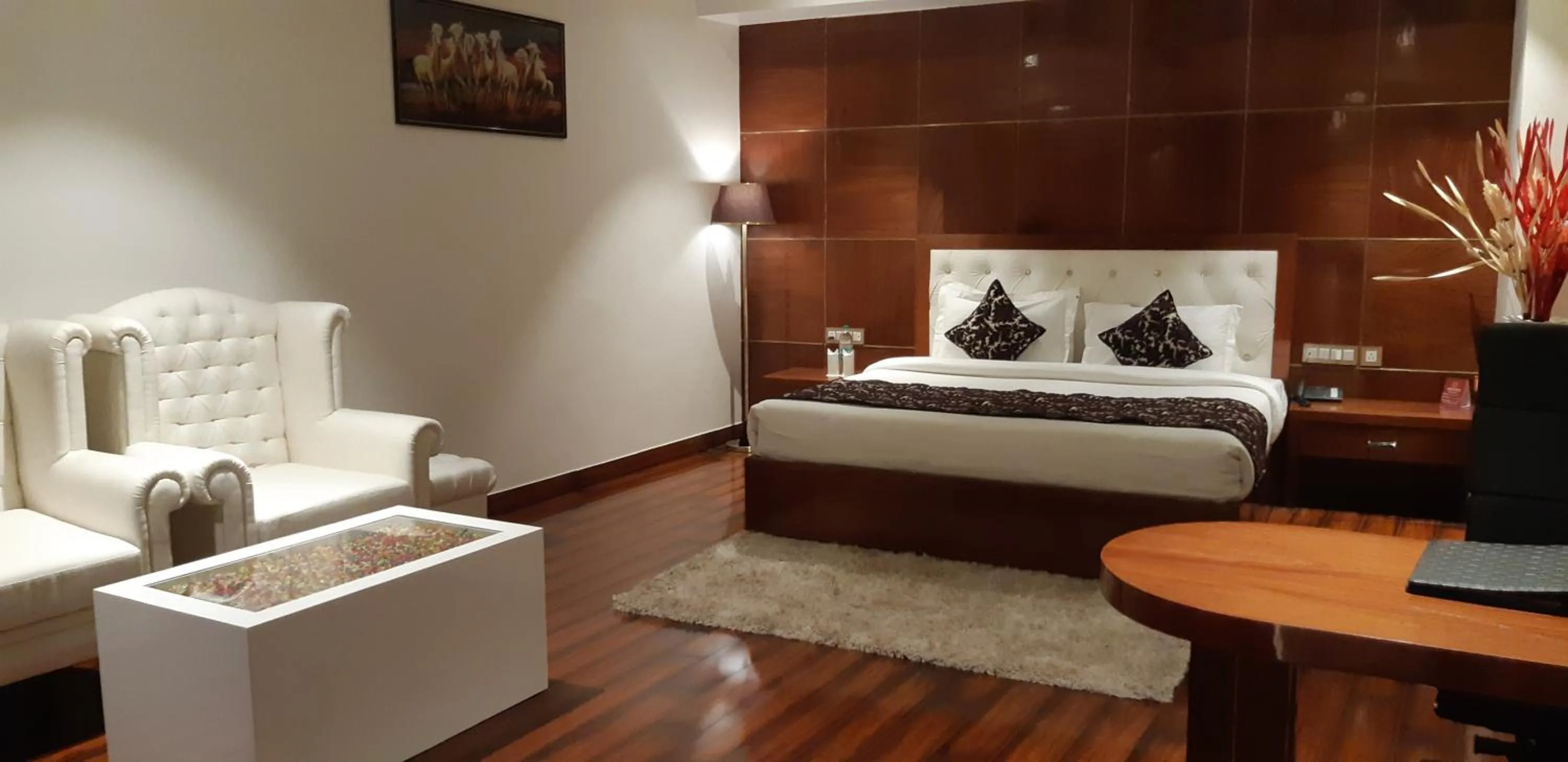 Photo of the whole room, Bed in Grand Geet Hotels