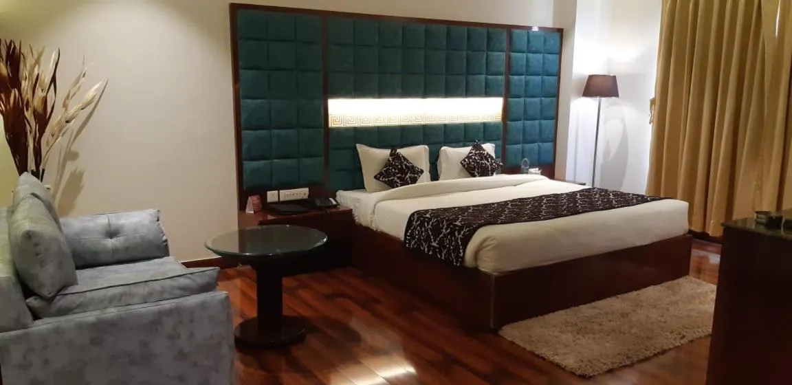 Bed in Grand Geet Hotels