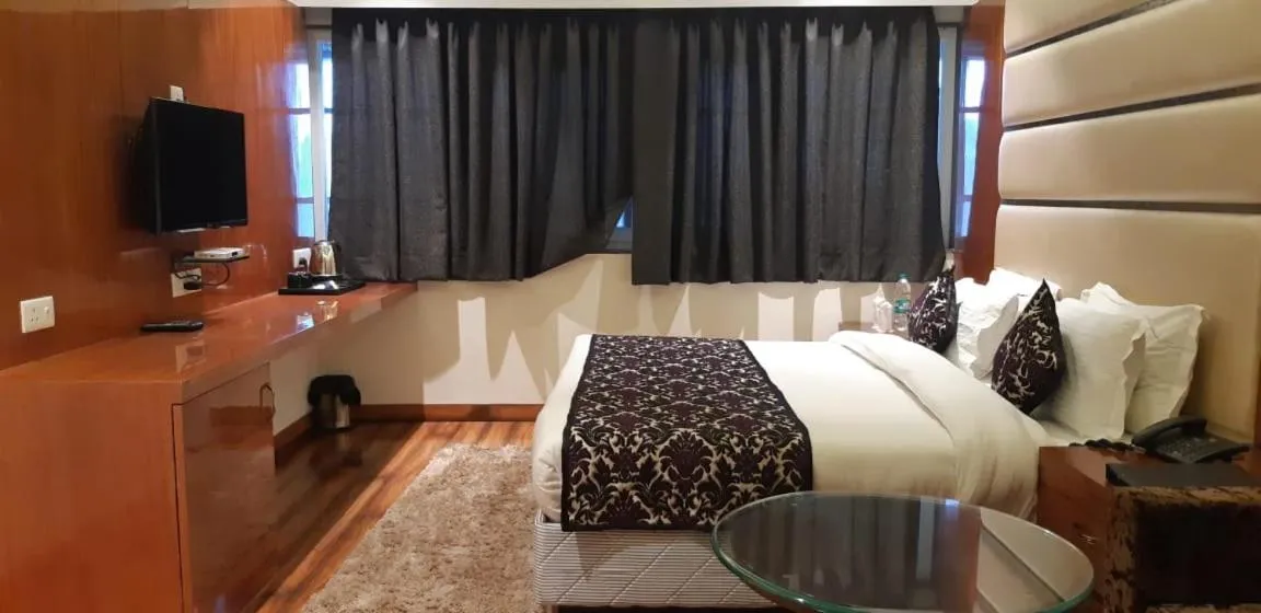 Bed in Grand Geet Hotels