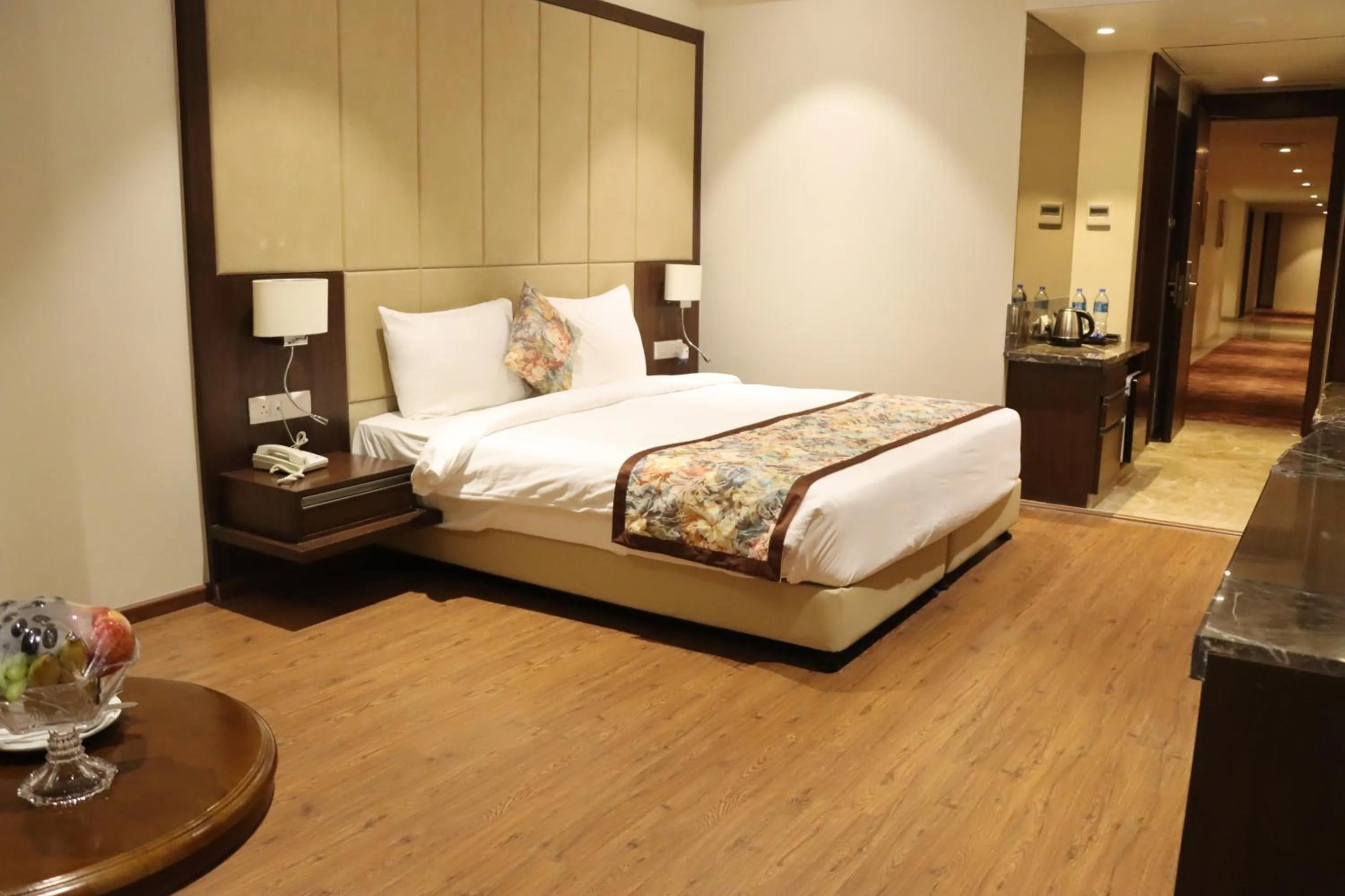Bed in Pride Hotel Bhopal