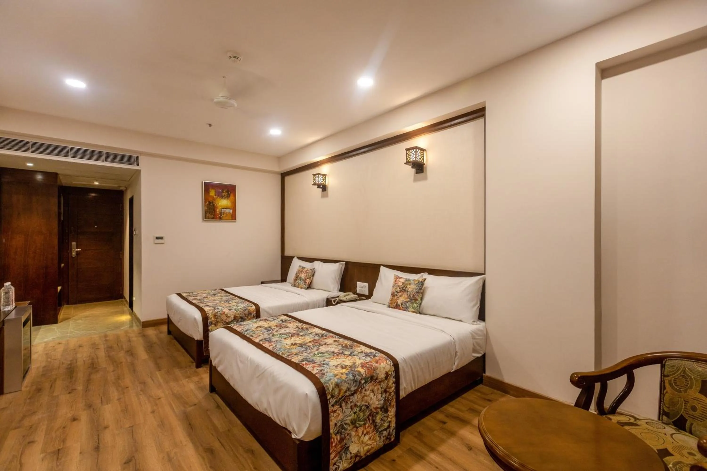 Bed in Pride Hotel Bhopal