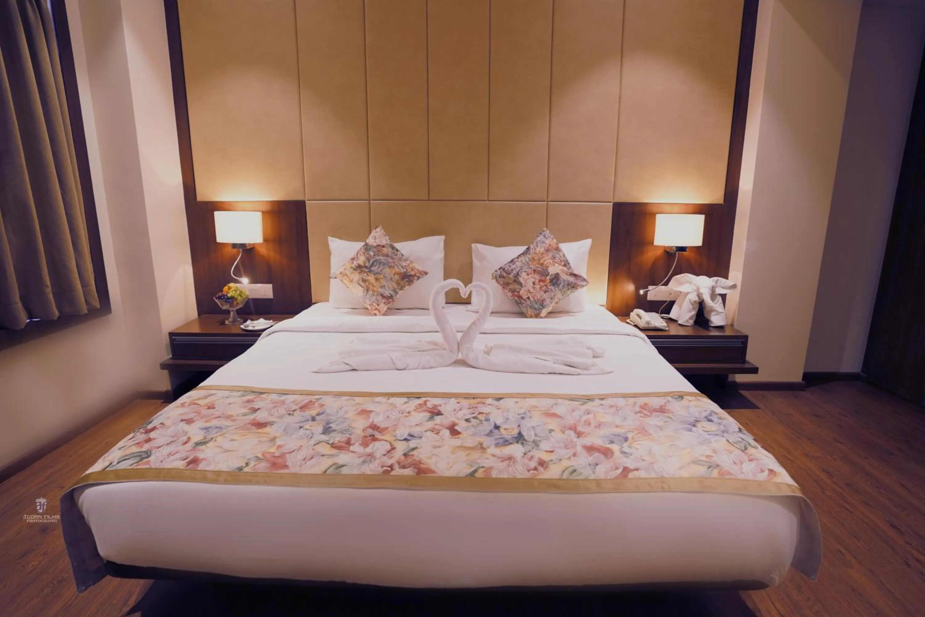 Bed in Pride Hotel Bhopal