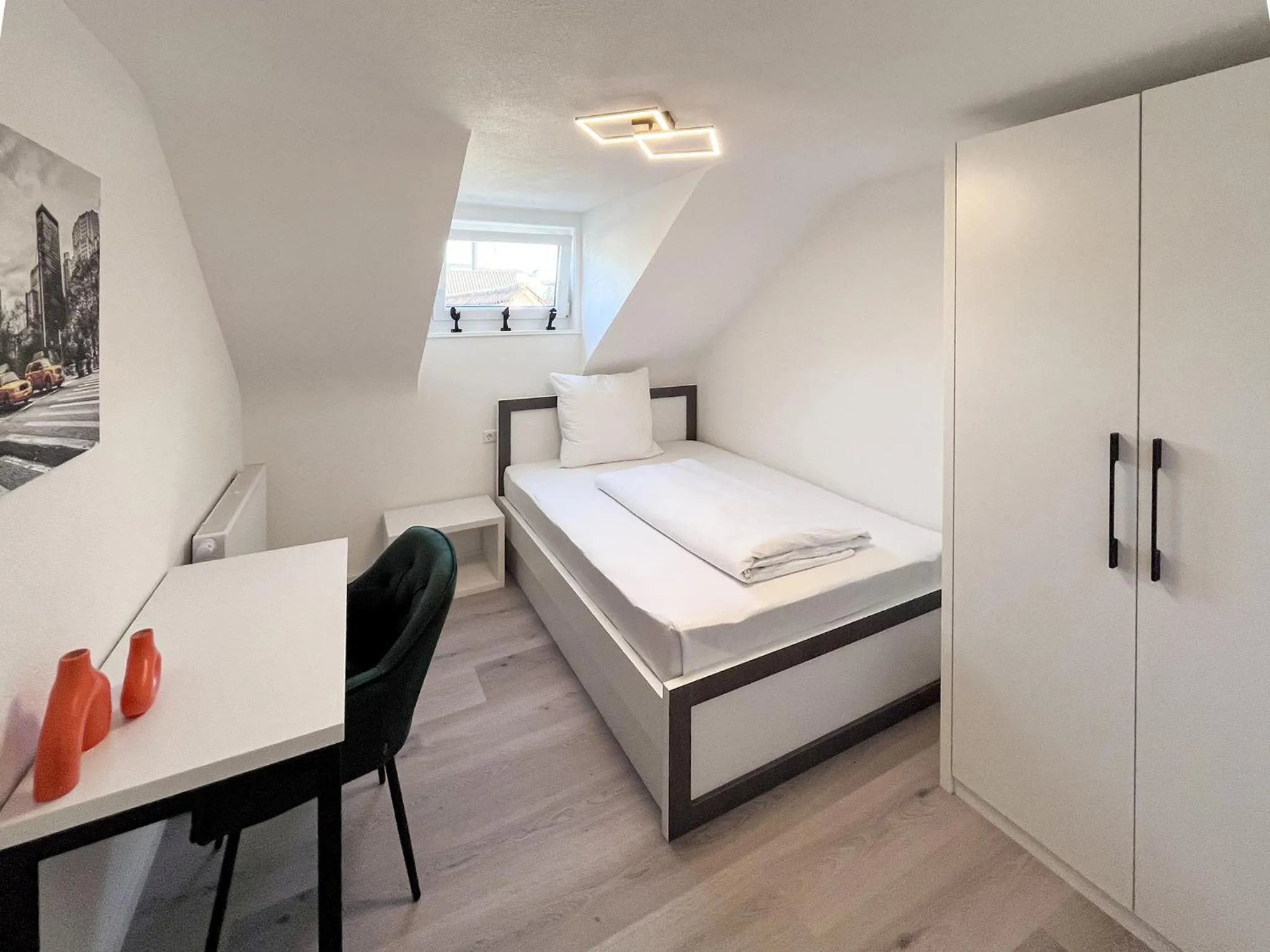 Photo of the whole room, Bed in DORMERO Hotel Reutlingen