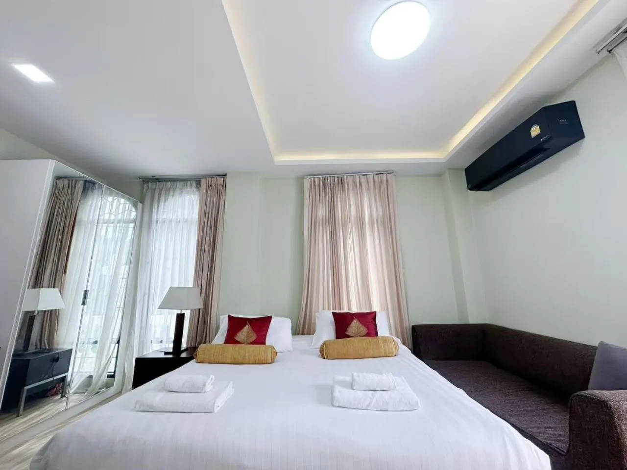 Bed in Daddy Dream Hotel and Residence