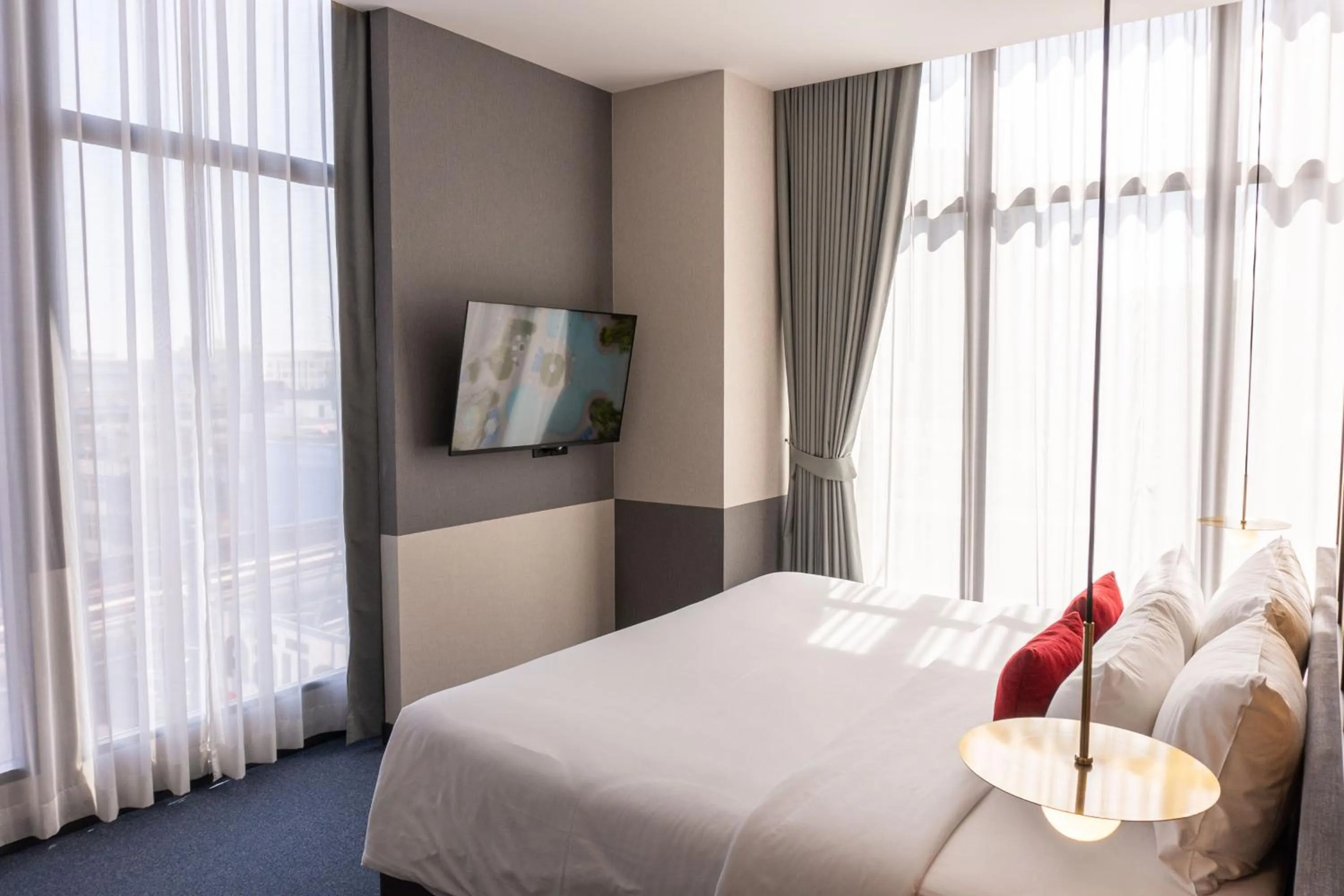 Bed in Ramada Plaza by Wyndham Bangkok Sukhumvit 48