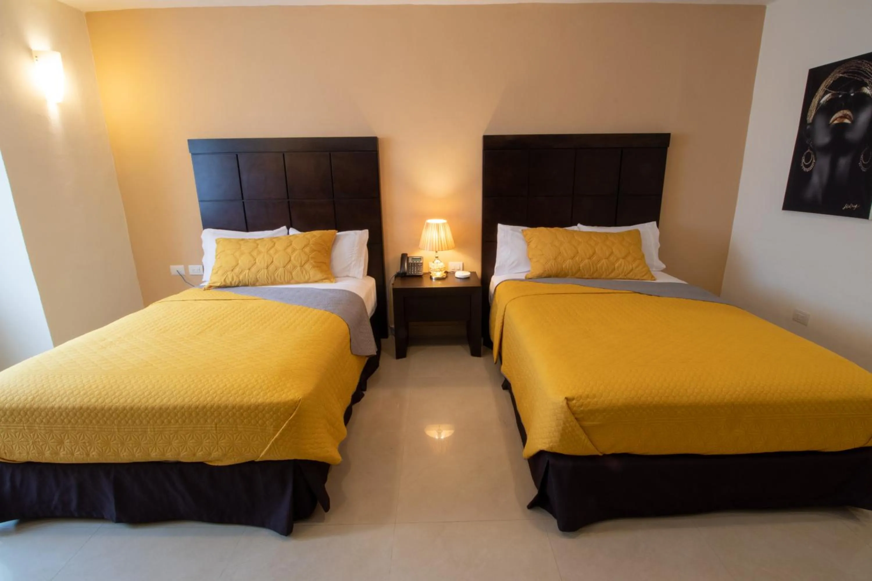 Bed in Hotel Villas Segovia Playa del Carmen