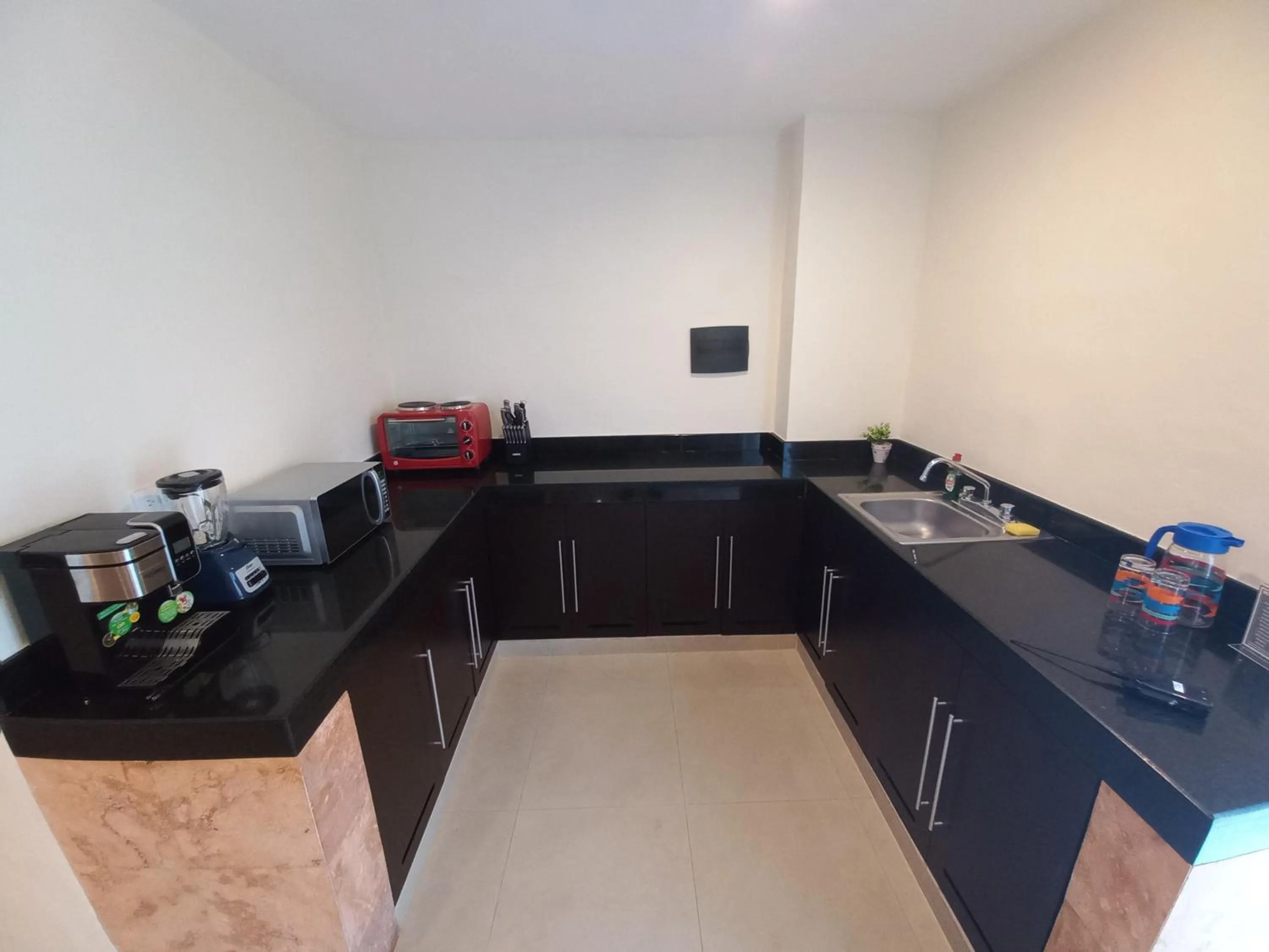 Kitchen or kitchenette in Hotel Villas Segovia Playa del Carmen