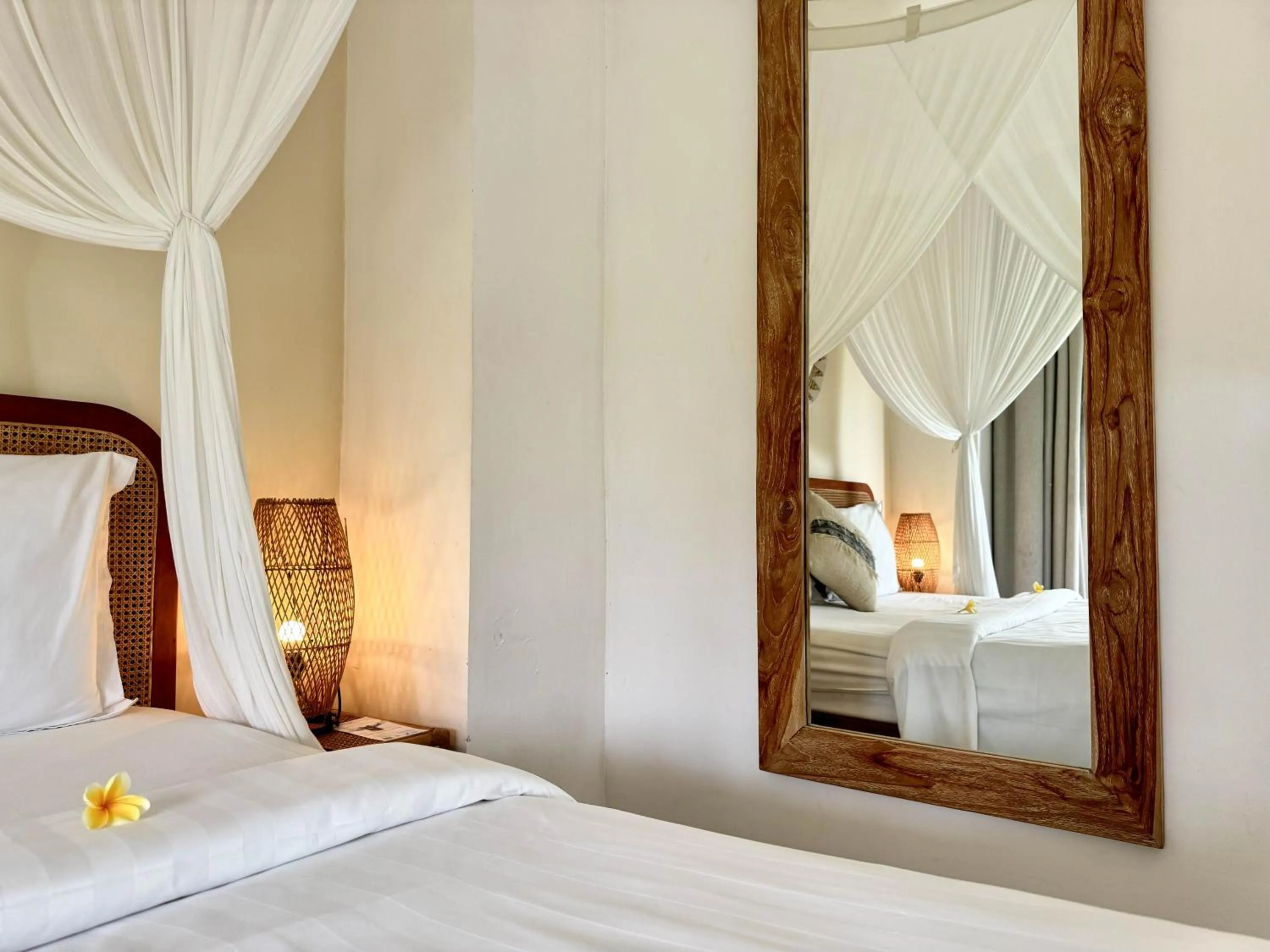 Bed in Hot Stone Club Ubud