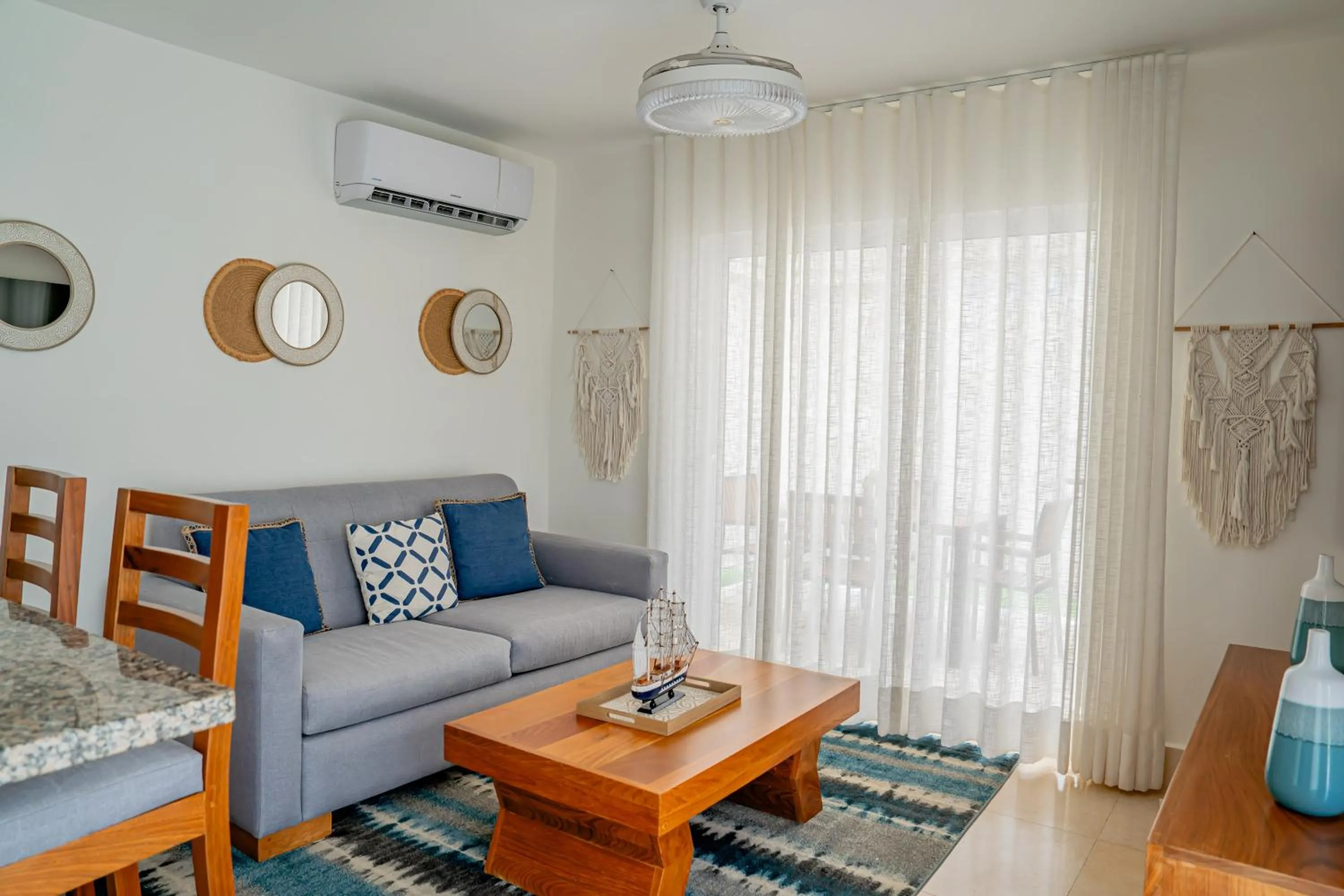 Living room in Xeliter Green One Playa Dorada