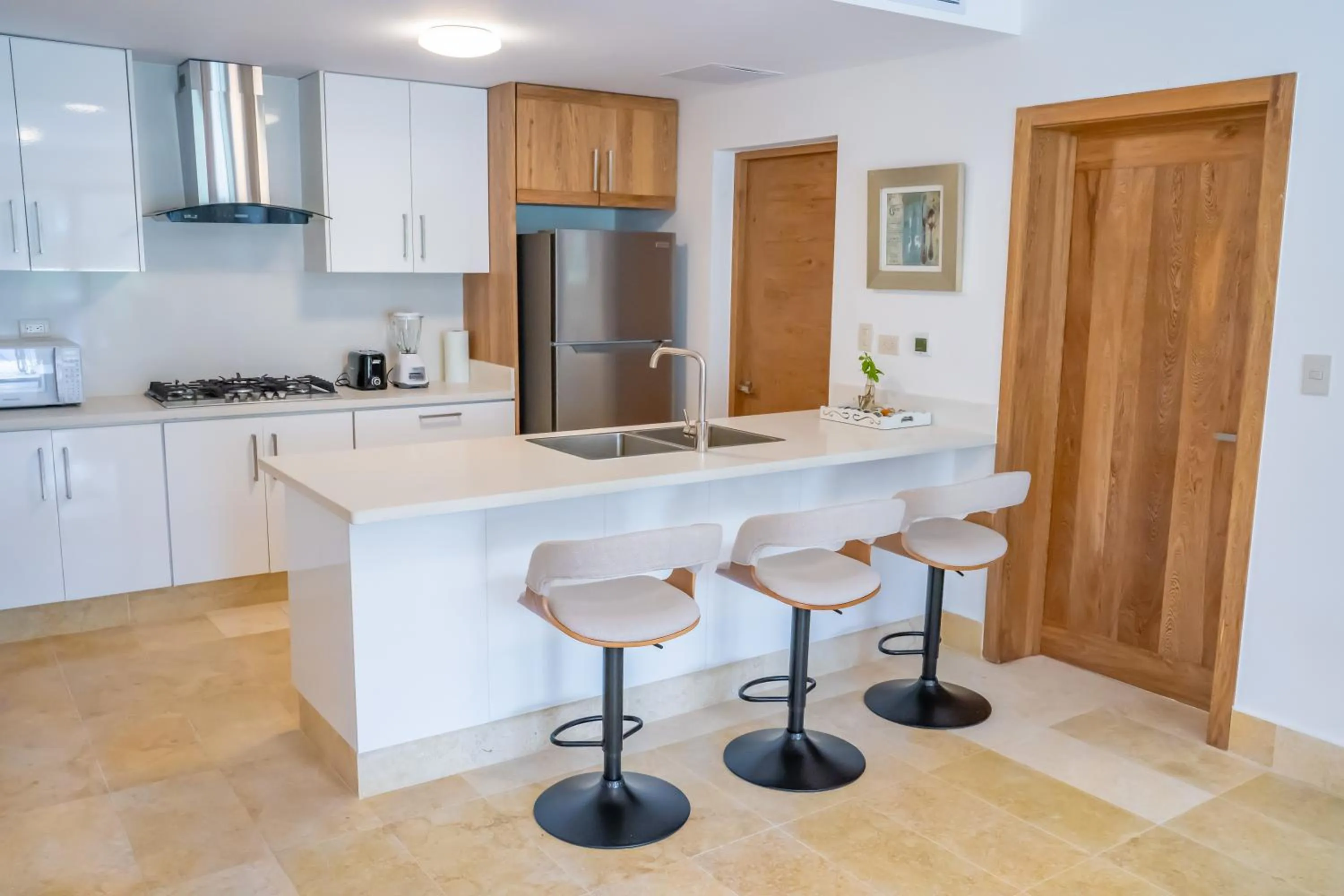 Kitchen or kitchenette in Xeliter Green One Playa Dorada