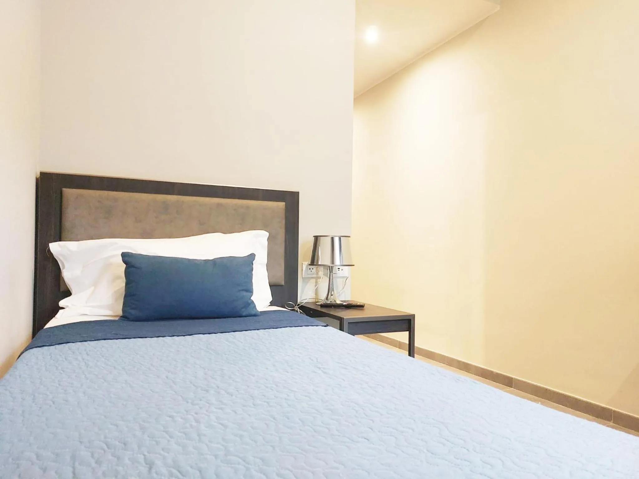 Bed in Hotel Vitruvio