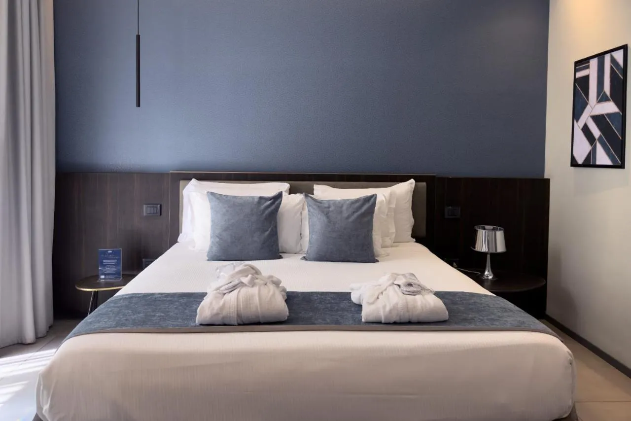 Bed in Hotel Vitruvio