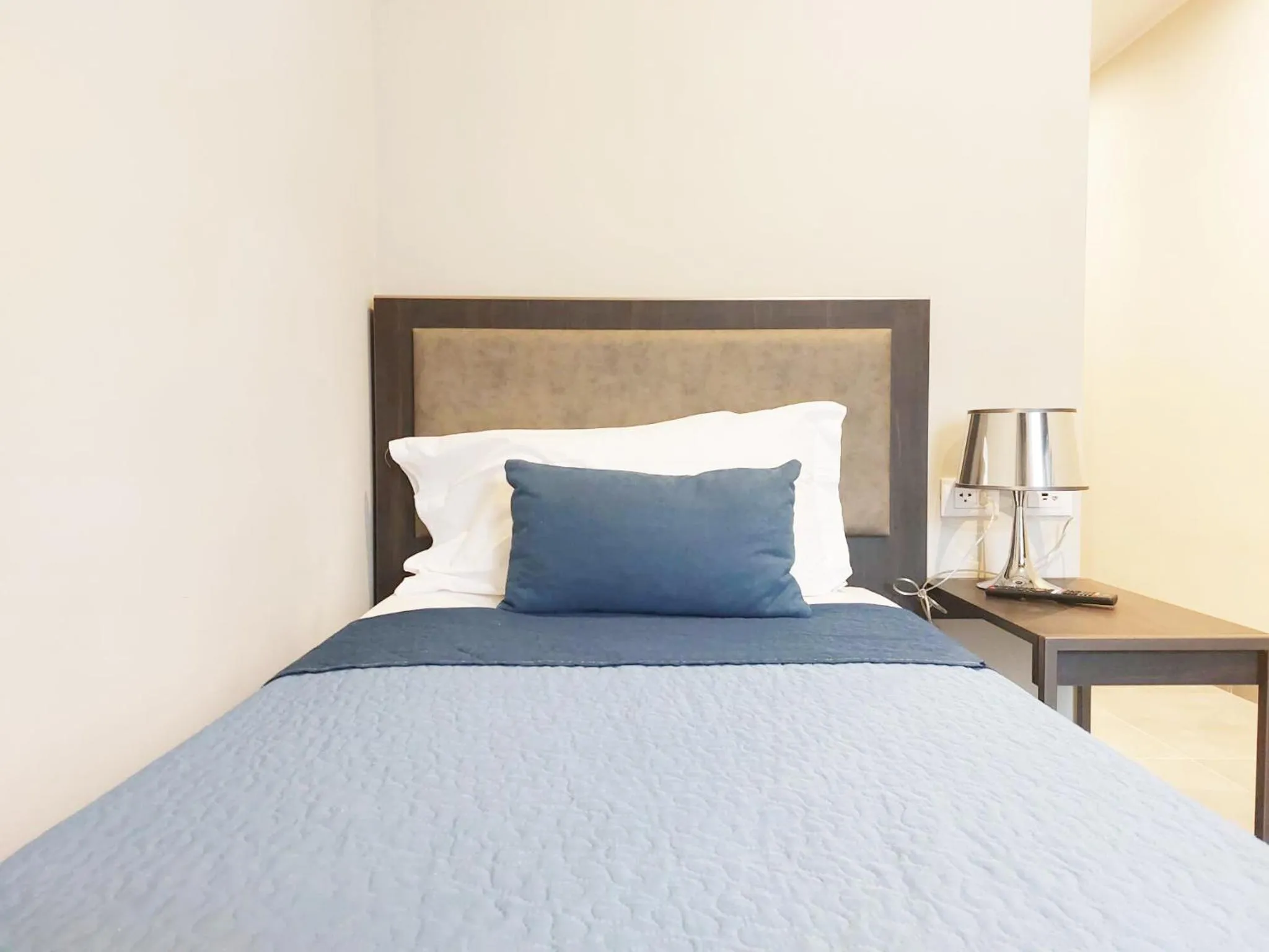 Bed in Hotel Vitruvio