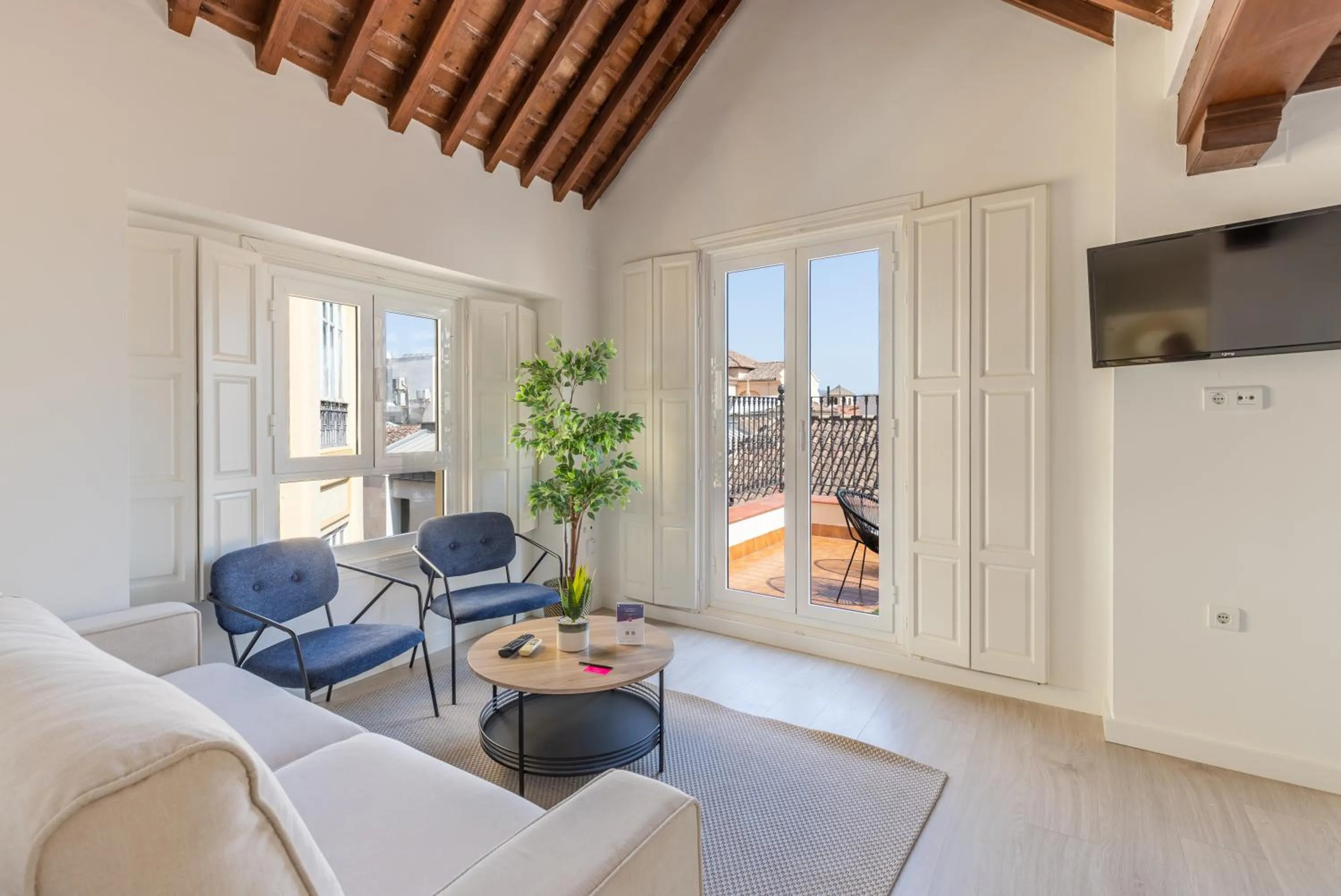 TV and multimedia in Thyssen Boutique Apartments by Caleta Homes