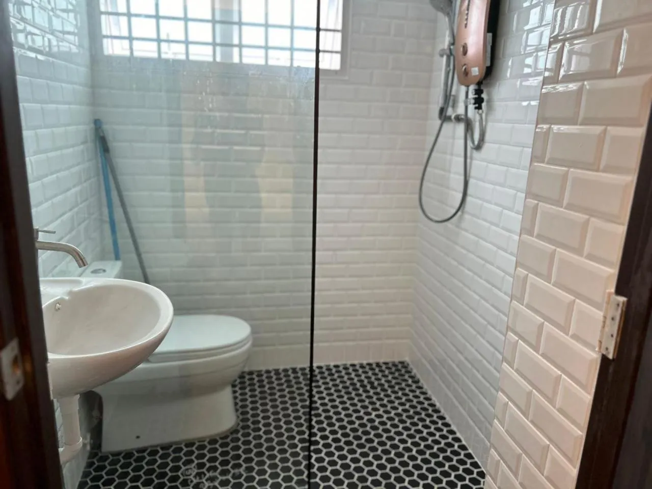 Shower in King's Lane Ipoh