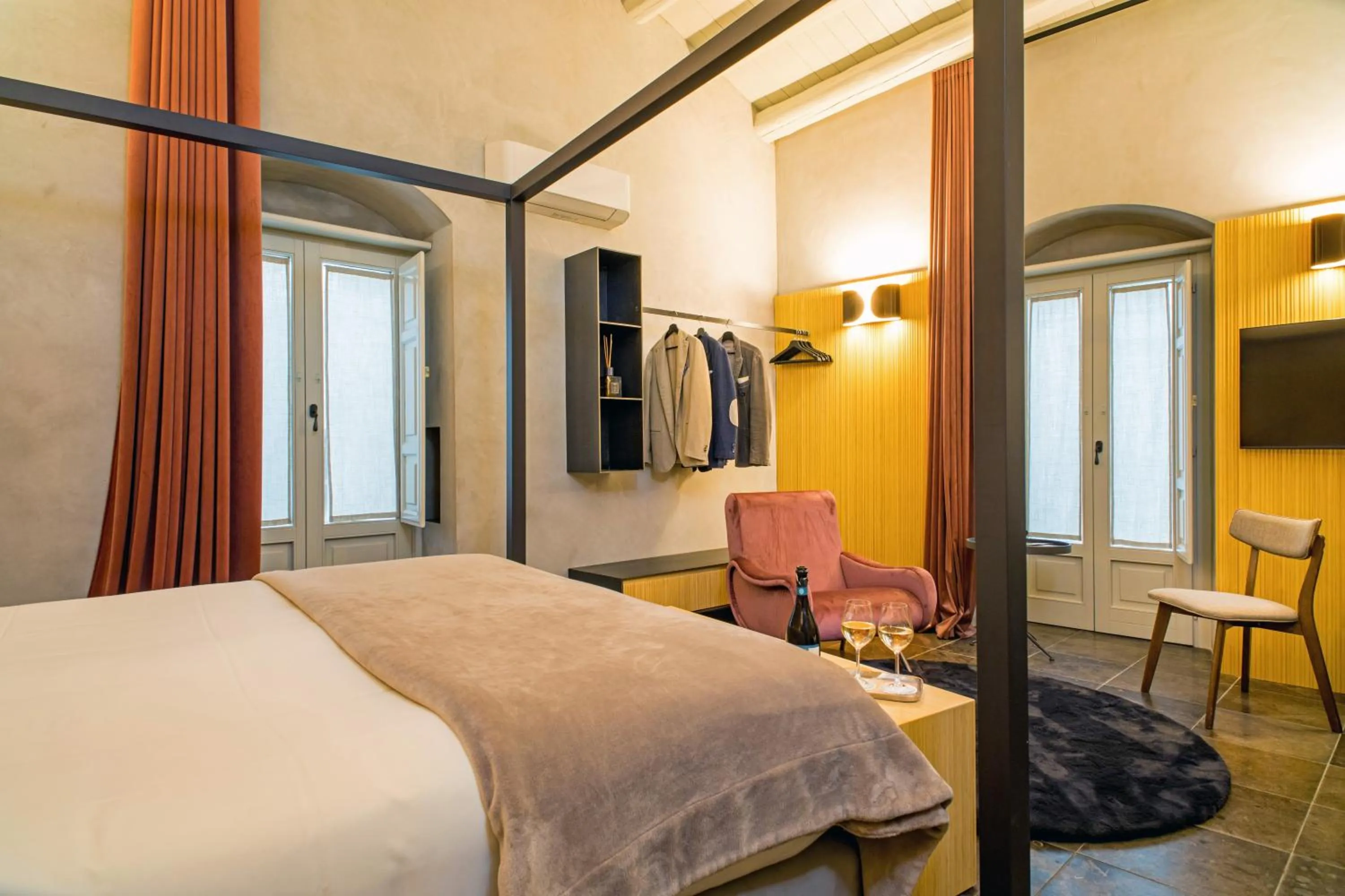 Photo of the whole room, Bed in Locanda Don Serafino Historical Boutique Hotel