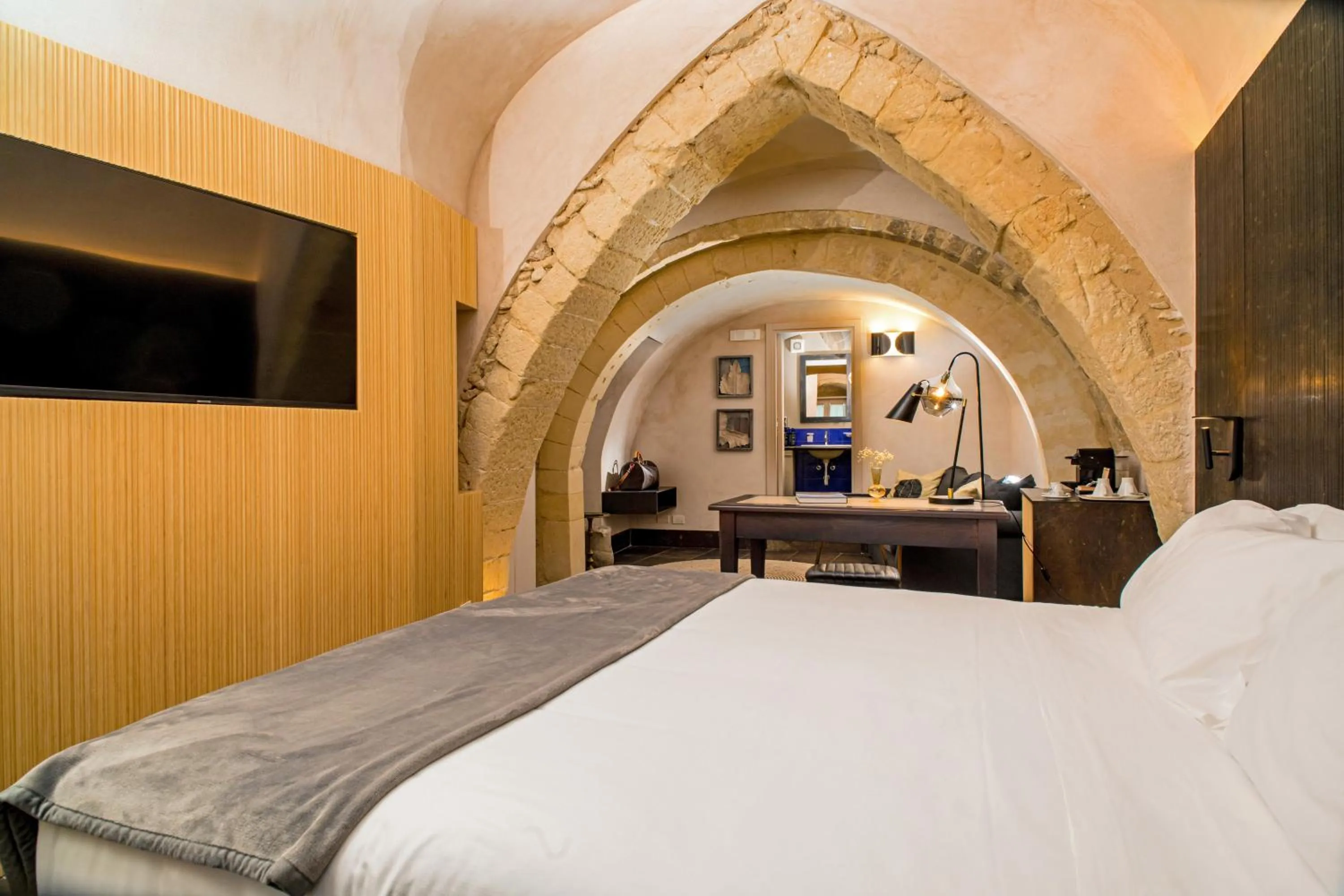 Photo of the whole room, Bed in Locanda Don Serafino Historical Boutique Hotel