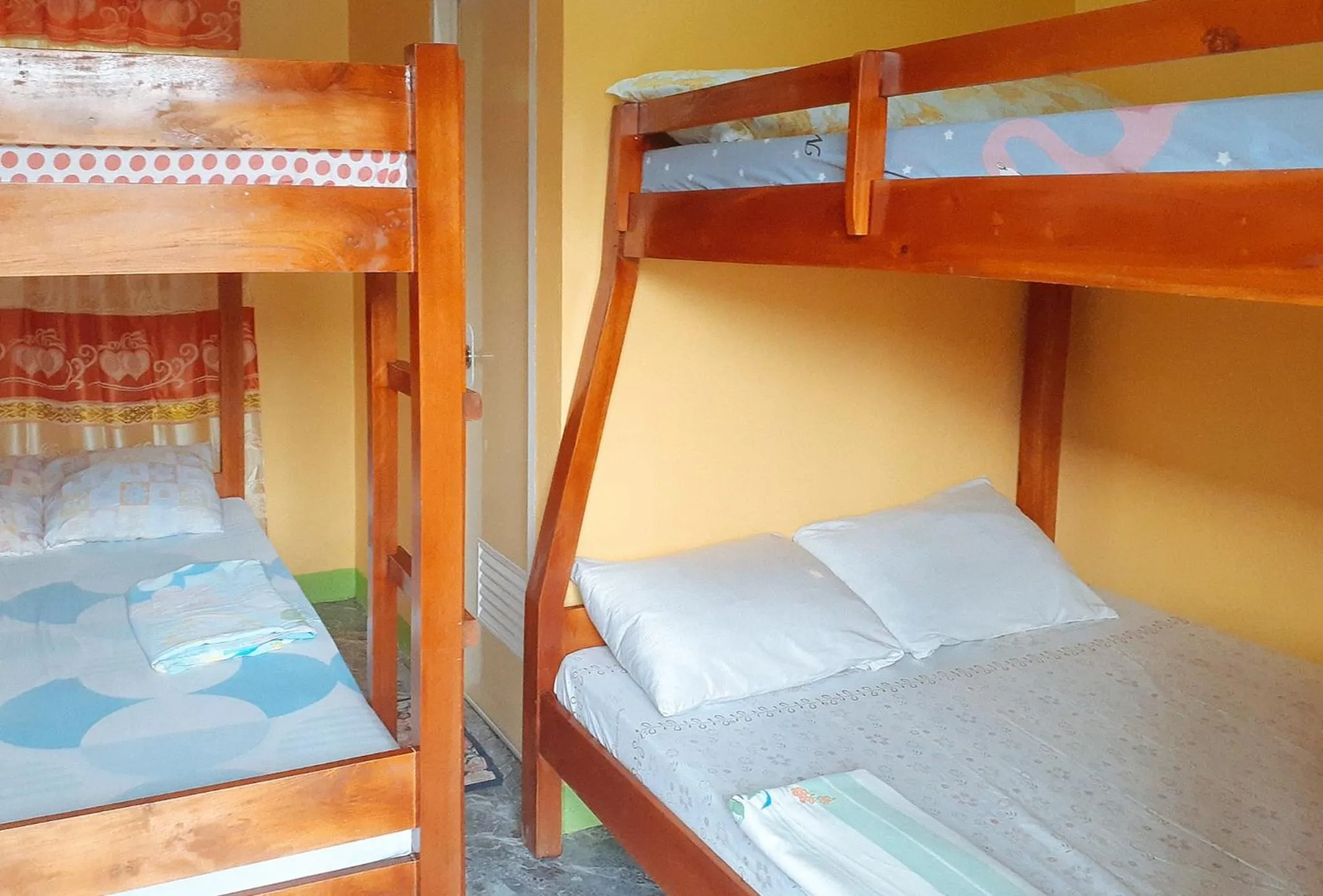 Bed in RedDoorz at Precious Dem Beach Resort Pagudpud