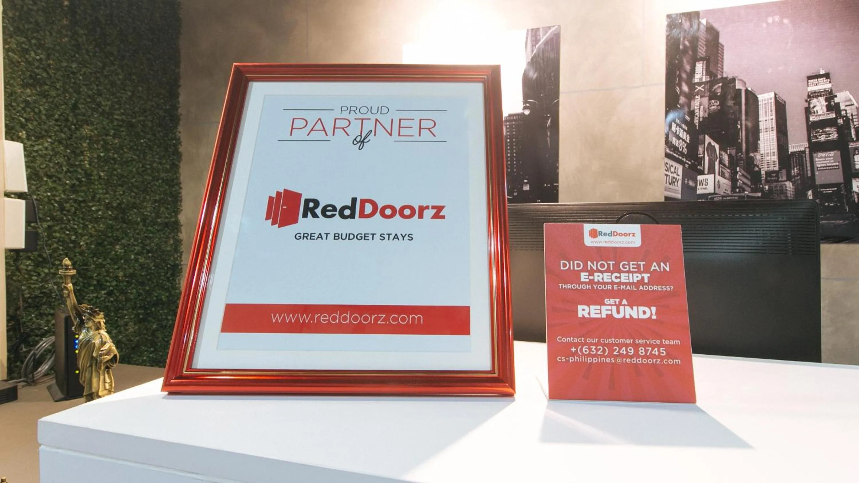 Property logo or sign in RedDoorz at Precious Dem Beach Resort Pagudpud