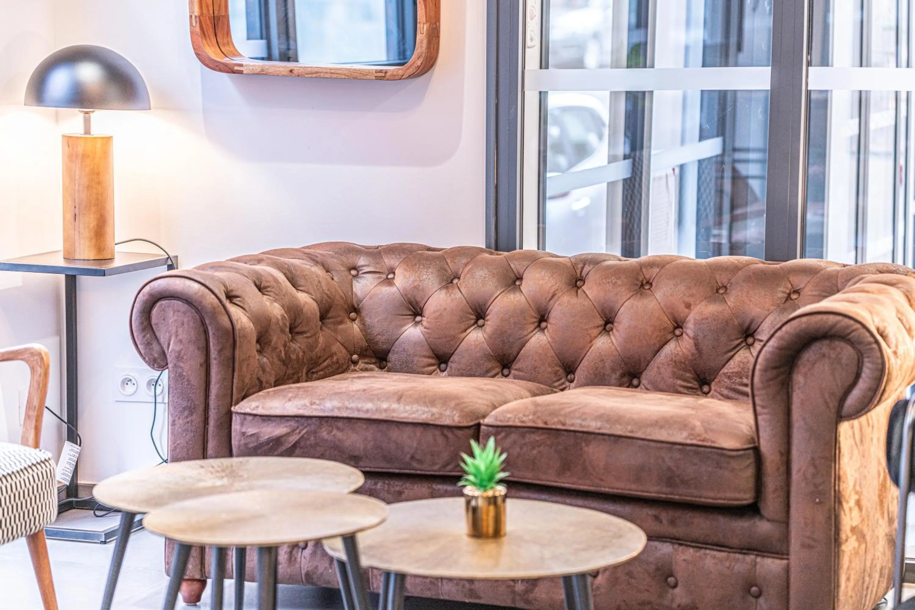 Seating area in Break & Home Clermont-Ferrand - Les Carmes Dechaux Appart'Hôtel