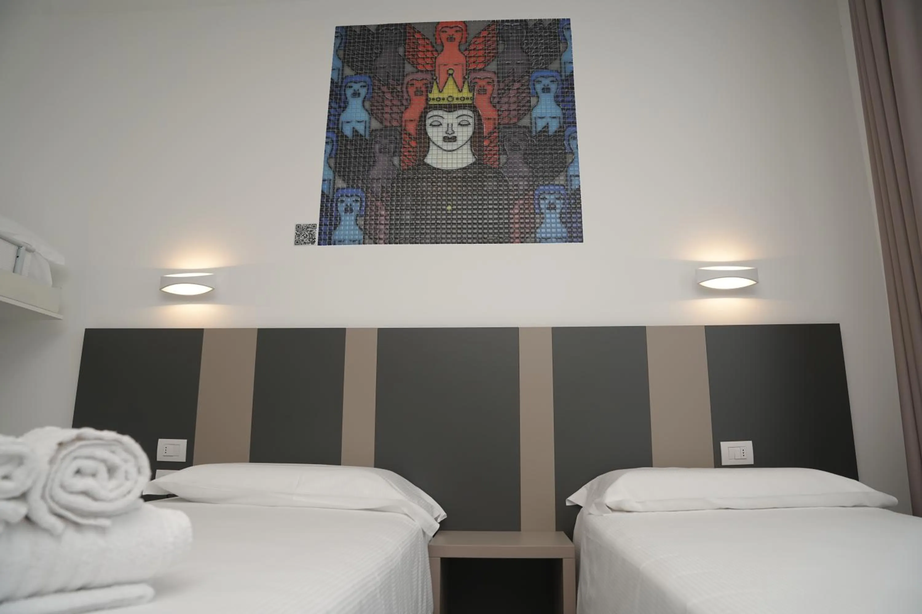 Bed in HOTEL MOSAICO