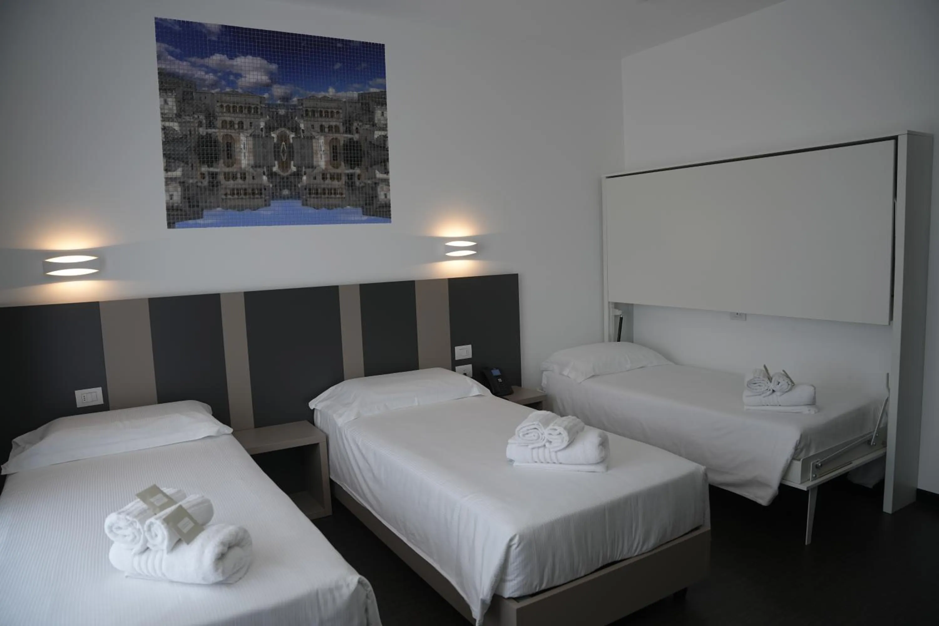 Bed in HOTEL MOSAICO