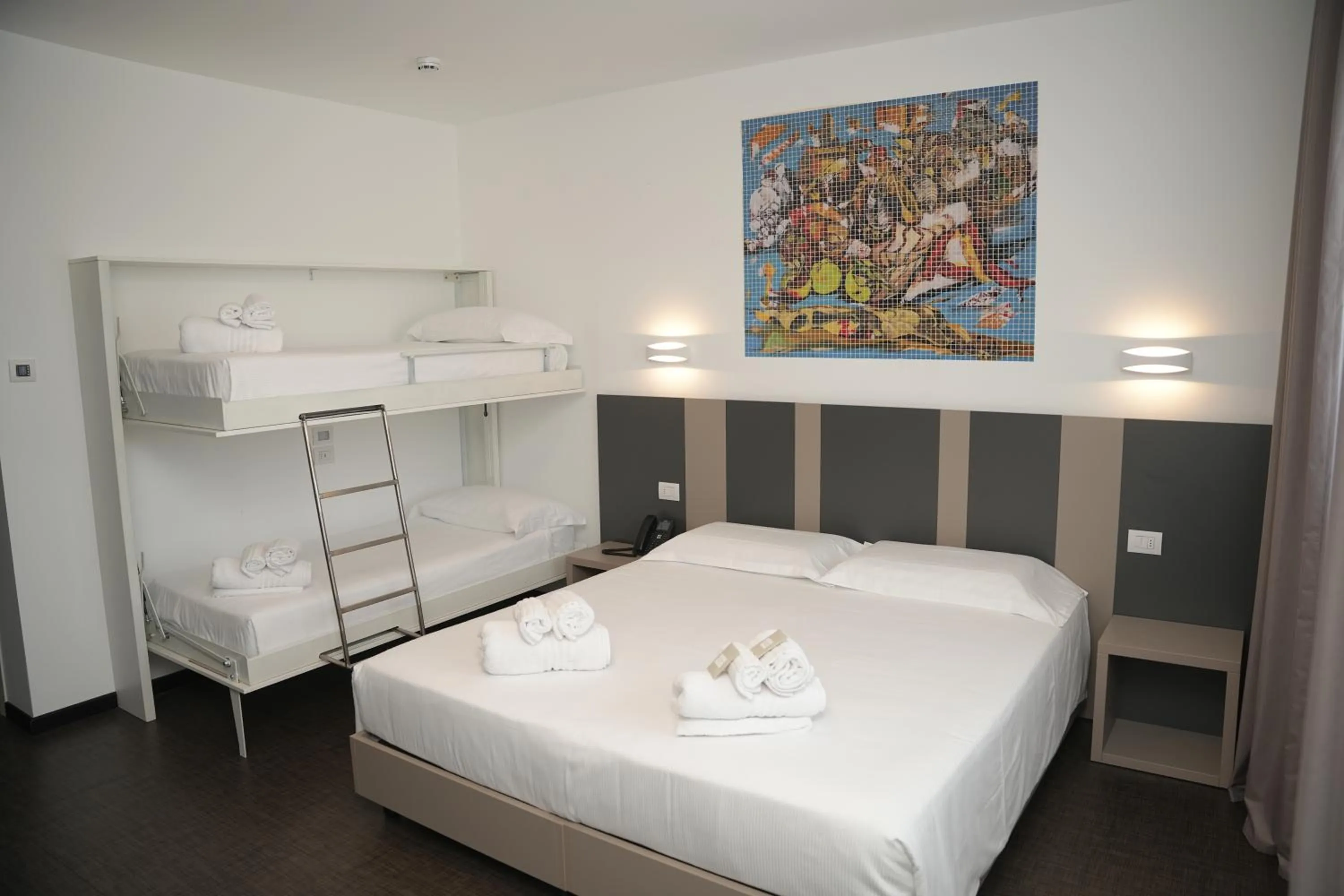 Bed in HOTEL MOSAICO