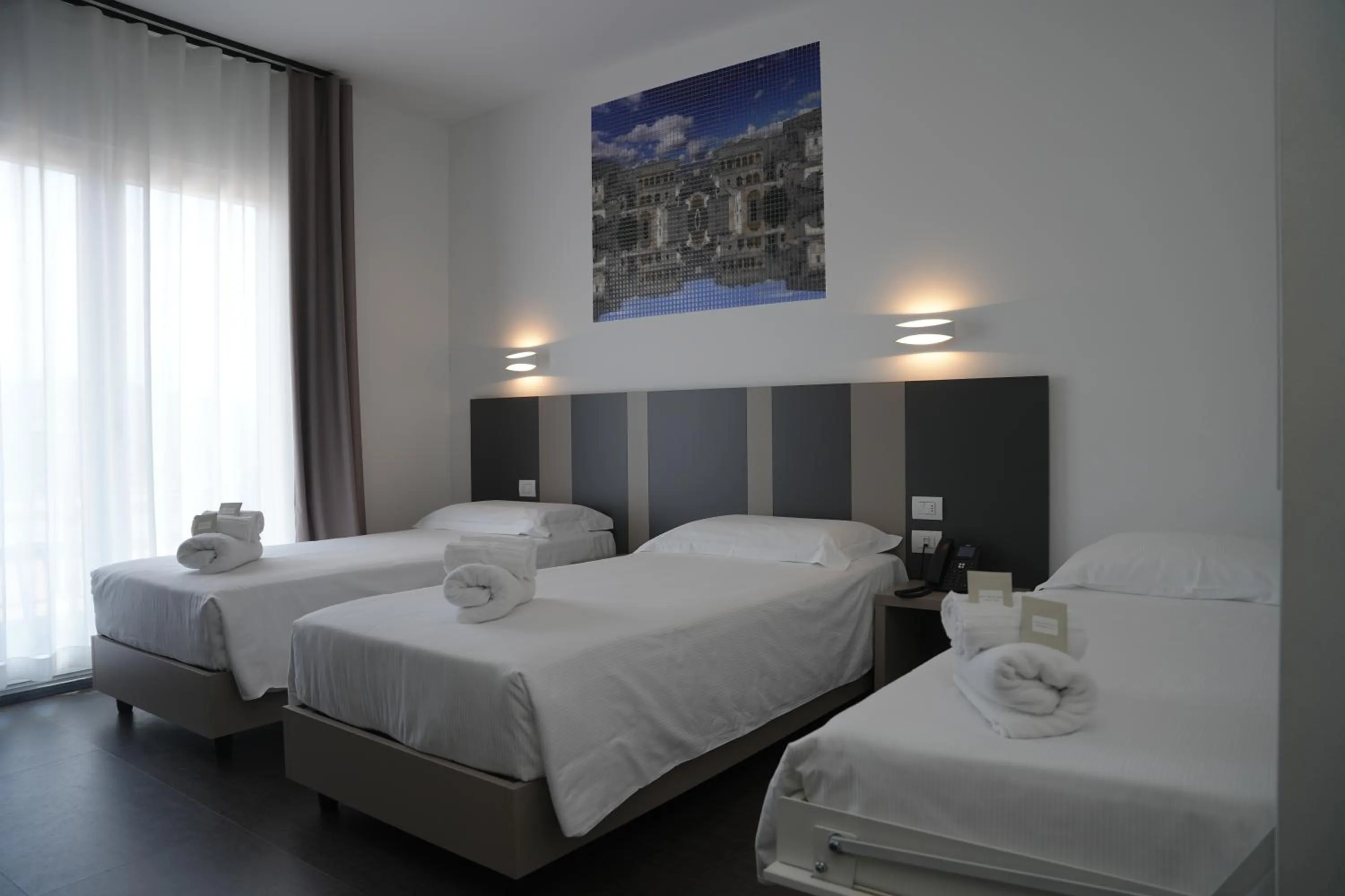 Bed in HOTEL MOSAICO