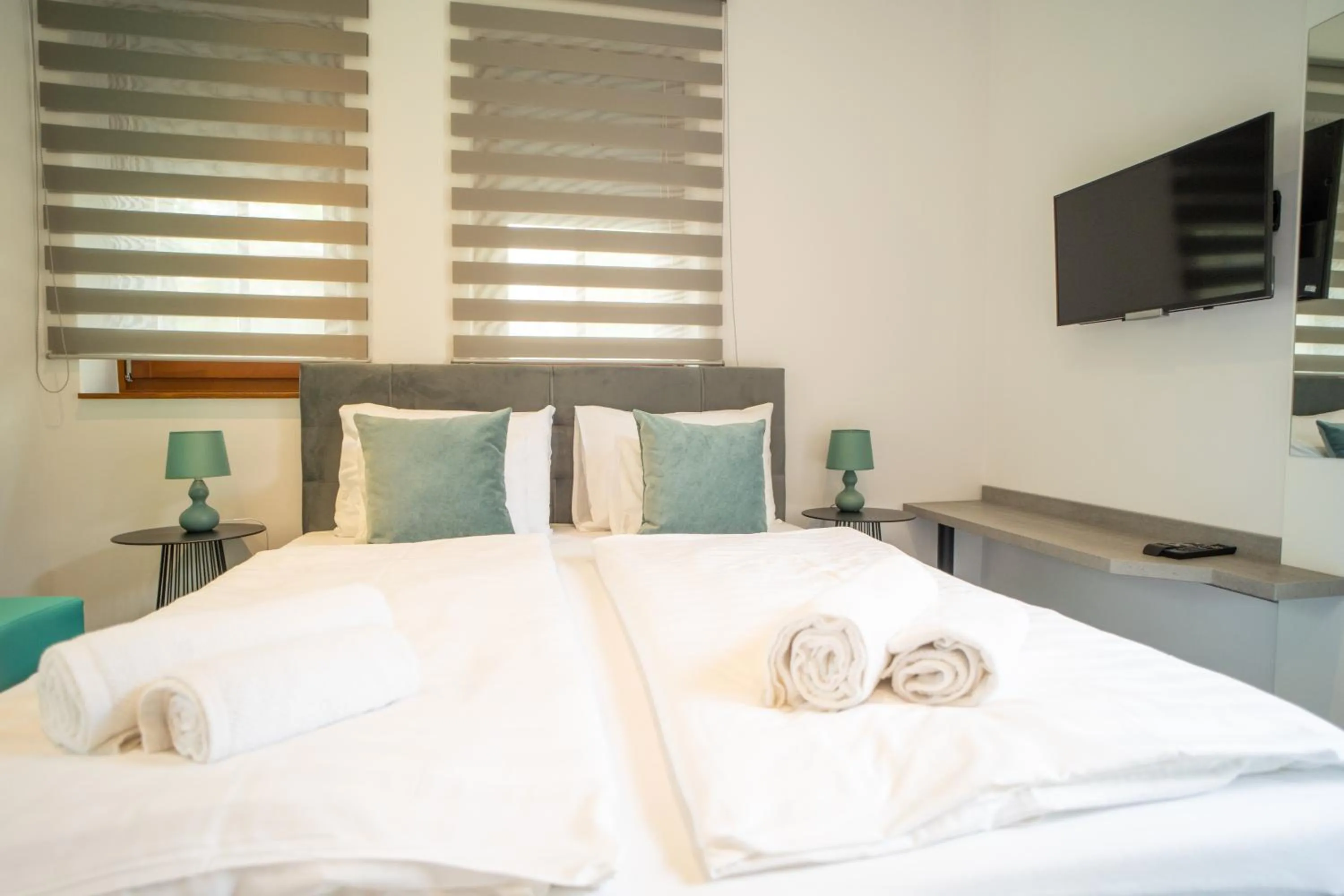 Bed in La Vita Prémium Panzió