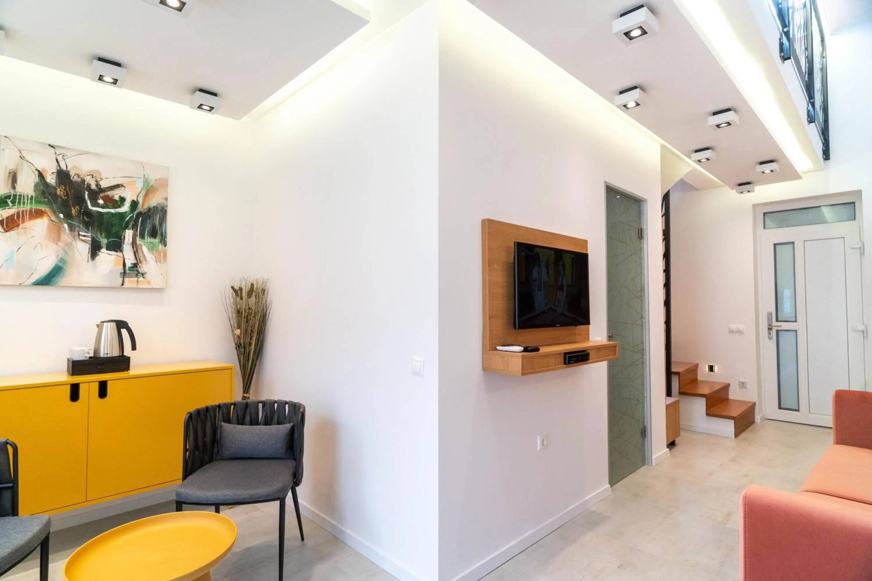 Communal lounge/ TV room in La Vita Prémium Panzió