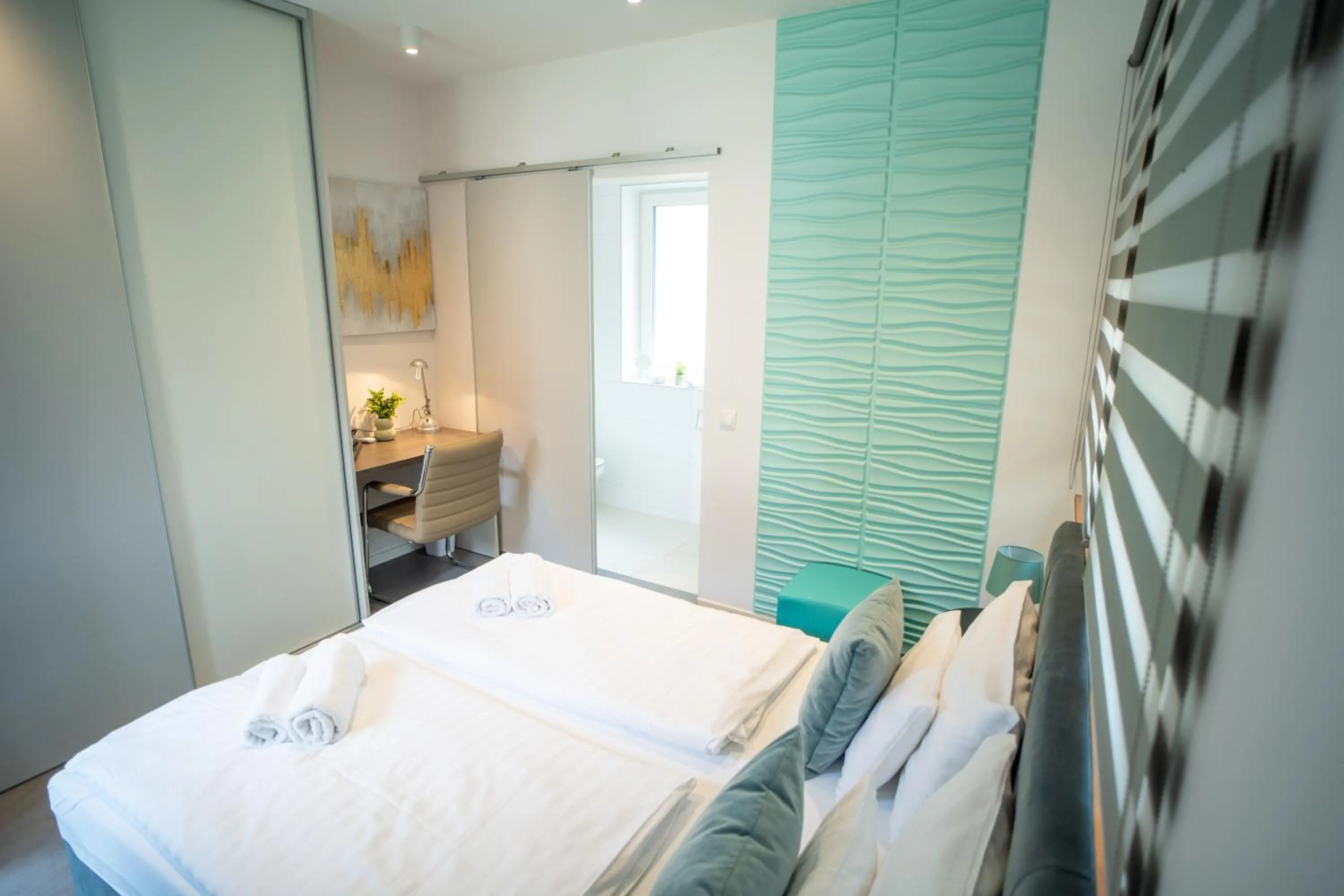 Bed in La Vita Prémium Panzió