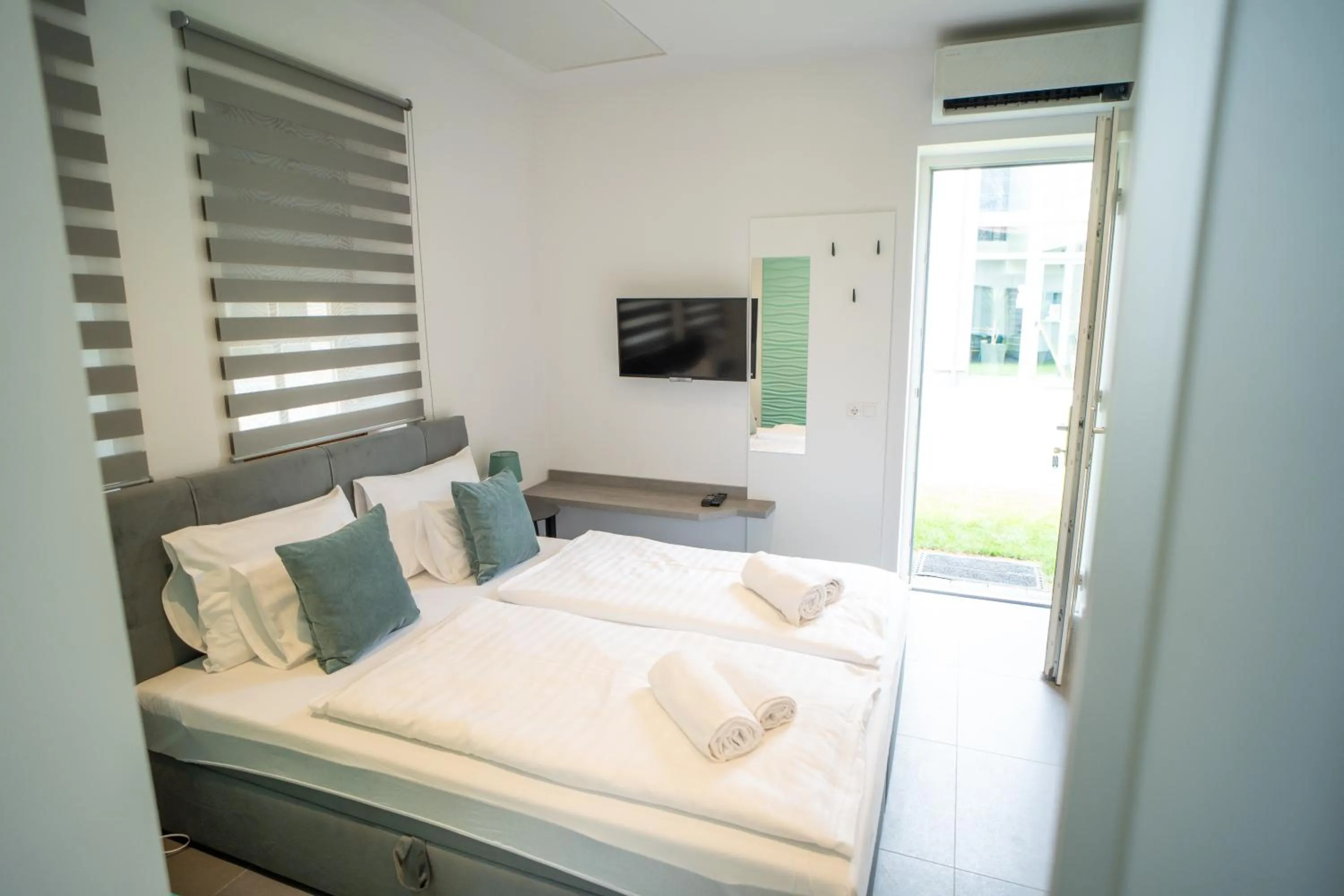 Bed in La Vita Prémium Panzió
