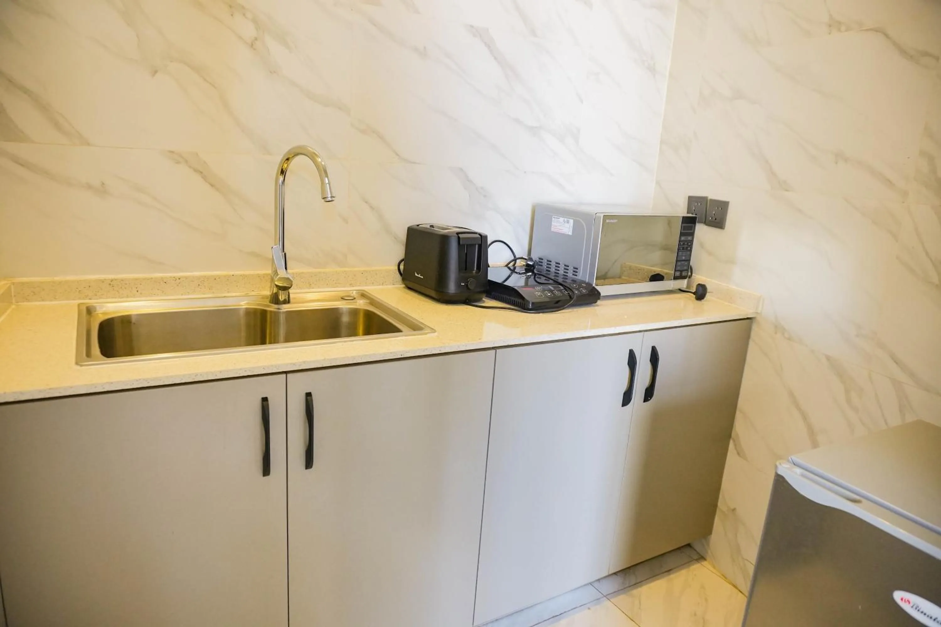 Kitchen or kitchenette in AXIL HÔTEL