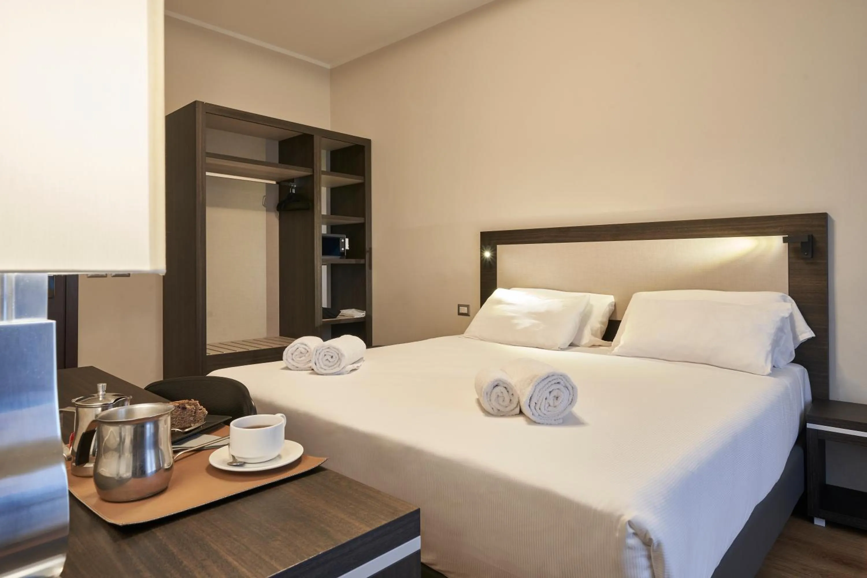 Bed in Hotel Leonardo da Vinci