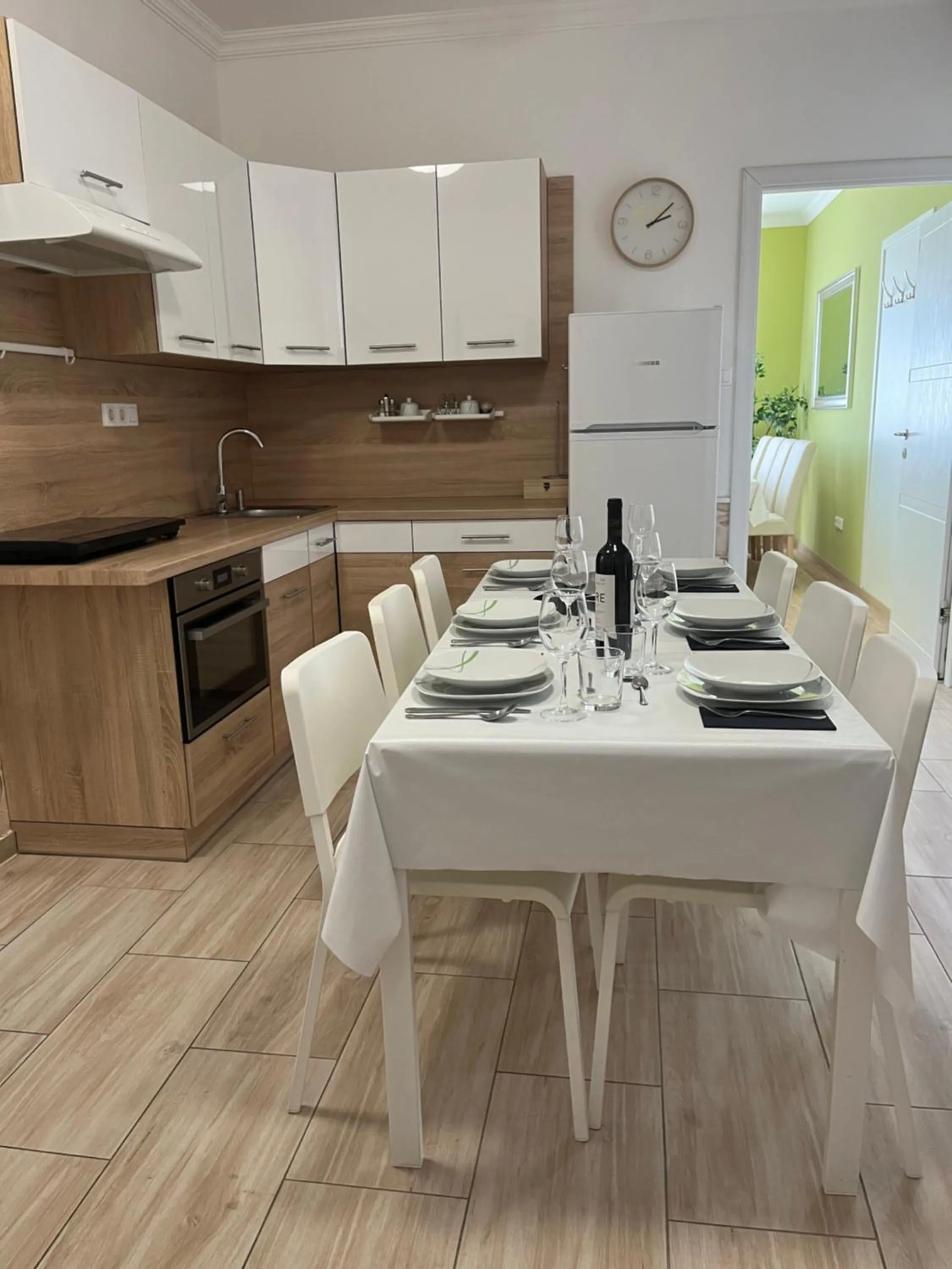 Kitchen or kitchenette in Camille Apartmanhouse