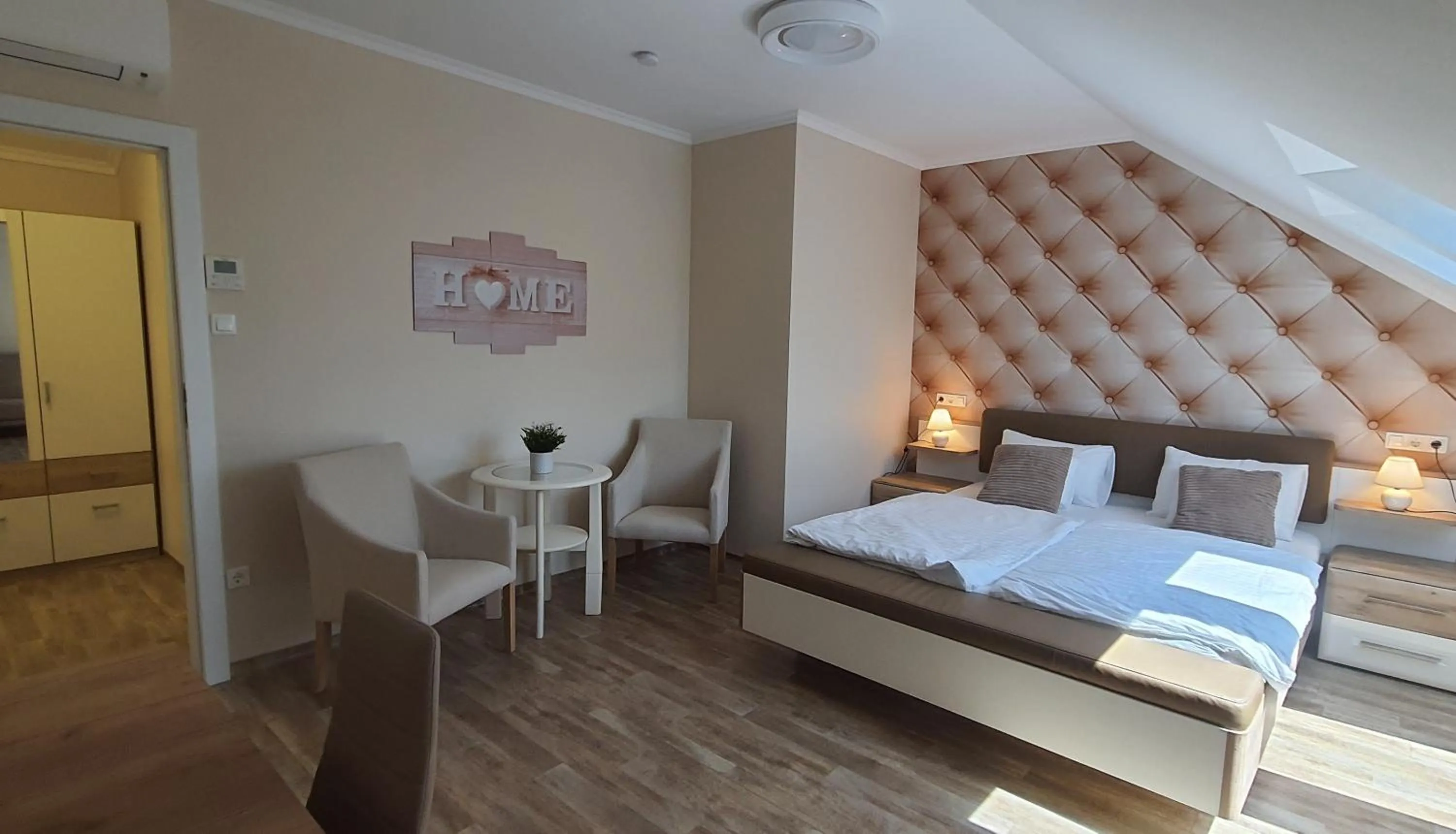 Bed in Camille Apartmanhouse